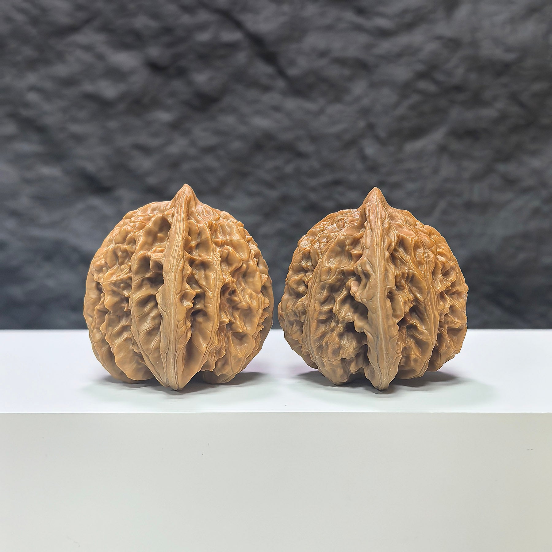 Pair of Peach Heart Xiayunling Wenwan walnuts from Wenwan Art, 41mm x 39mm, featuring smooth, polished walnut surfaces with natural patterns.