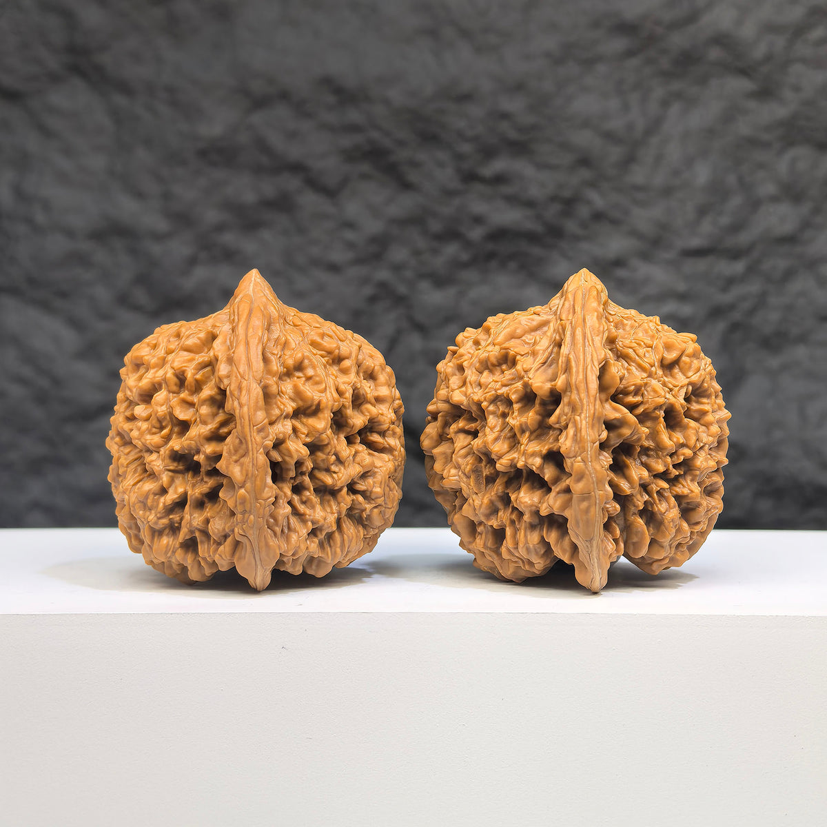 Pair of Peach Heart Concave Base Wenwan Walnuts with full star pattern, 40mm x 42mm, featuring deep base design by Wenwan Art.