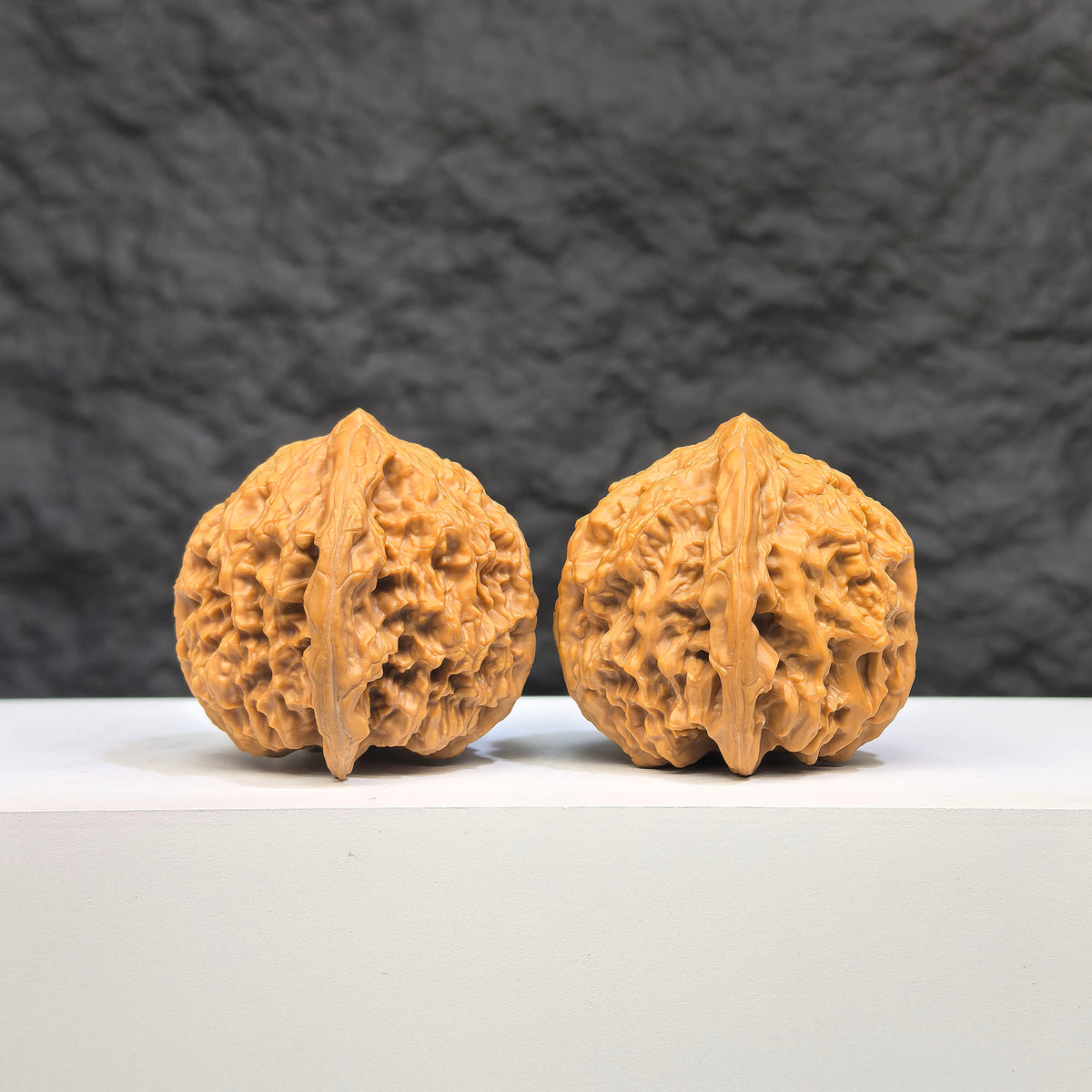 Pair of spherical full stars Wenwan walnuts from Wenwan Art, round-profile, 38mm size with intricate star patterns.