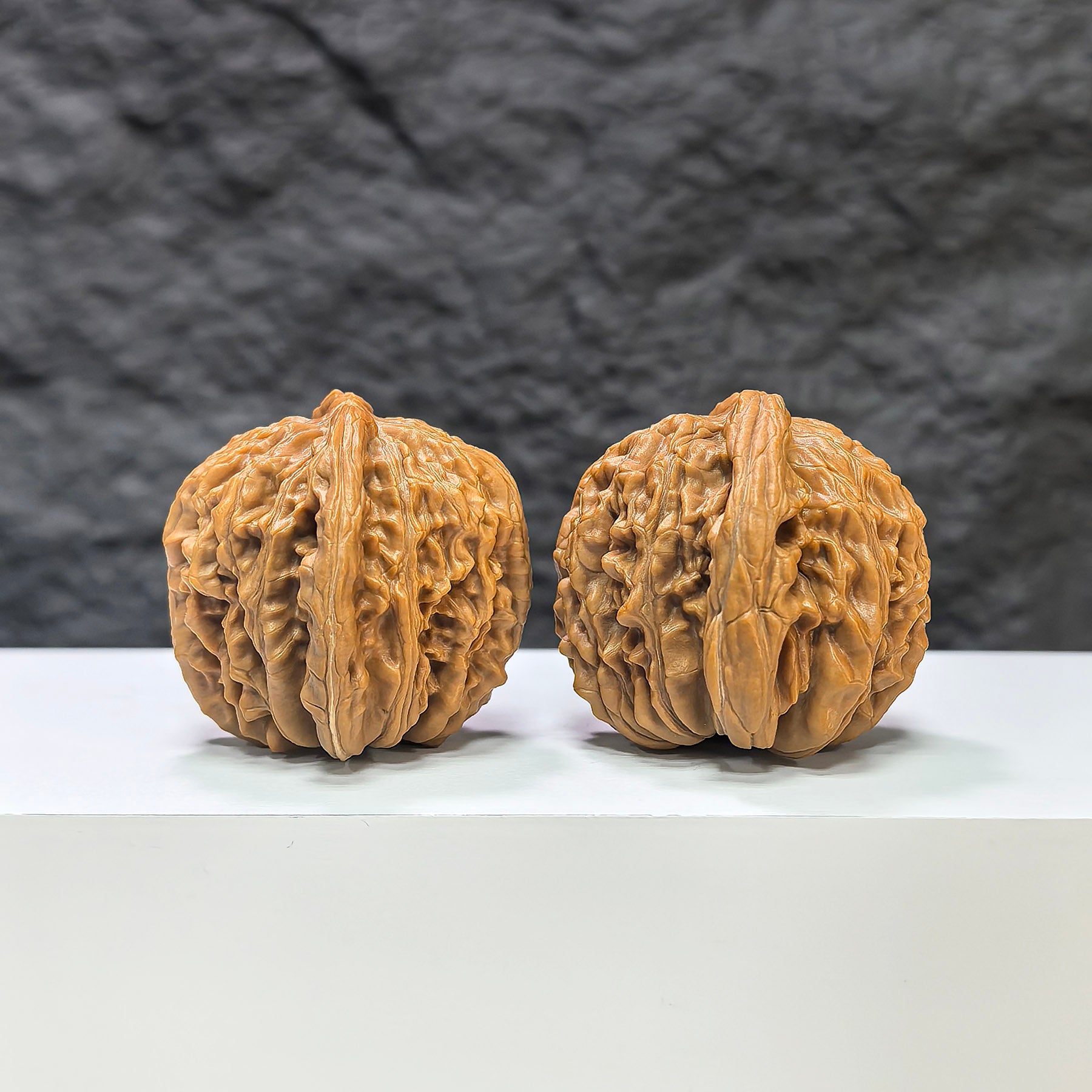 Pair of Sizuolou Classic Wenwan Walnuts from Wenwan Art, 43mm x 39mm, showcasing detailed natural walnut textures.