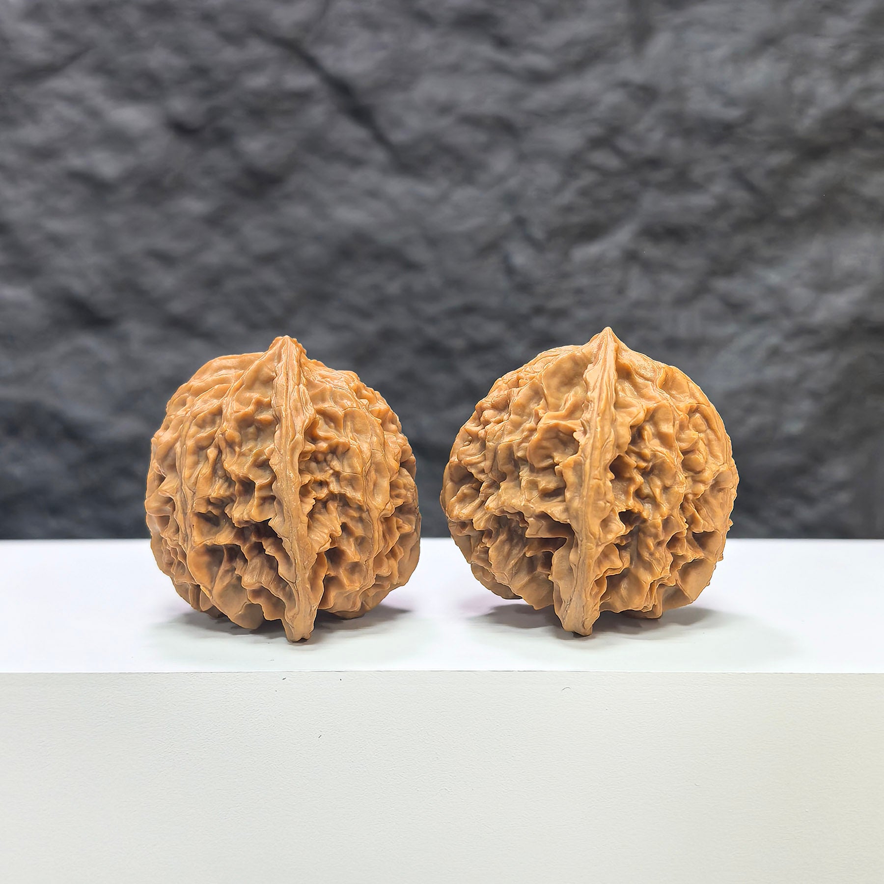 Pair of Wenwan Art Apple Garden Peach Heart Concave Base Walnut, deep-base Wenwan walnuts, 40mm x 37mm, natural wood finish.