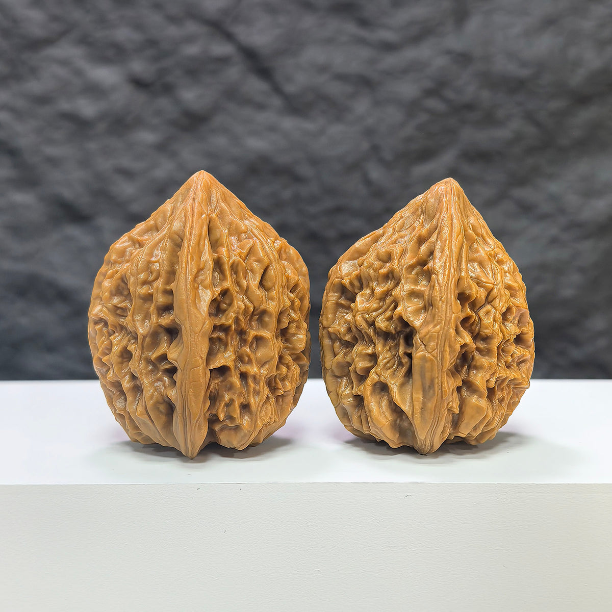 Pair of Beijing Chicken Heart Wenwan walnuts by Wenwan Art, showcasing 39mm size, with smooth, polished walnut surfaces.