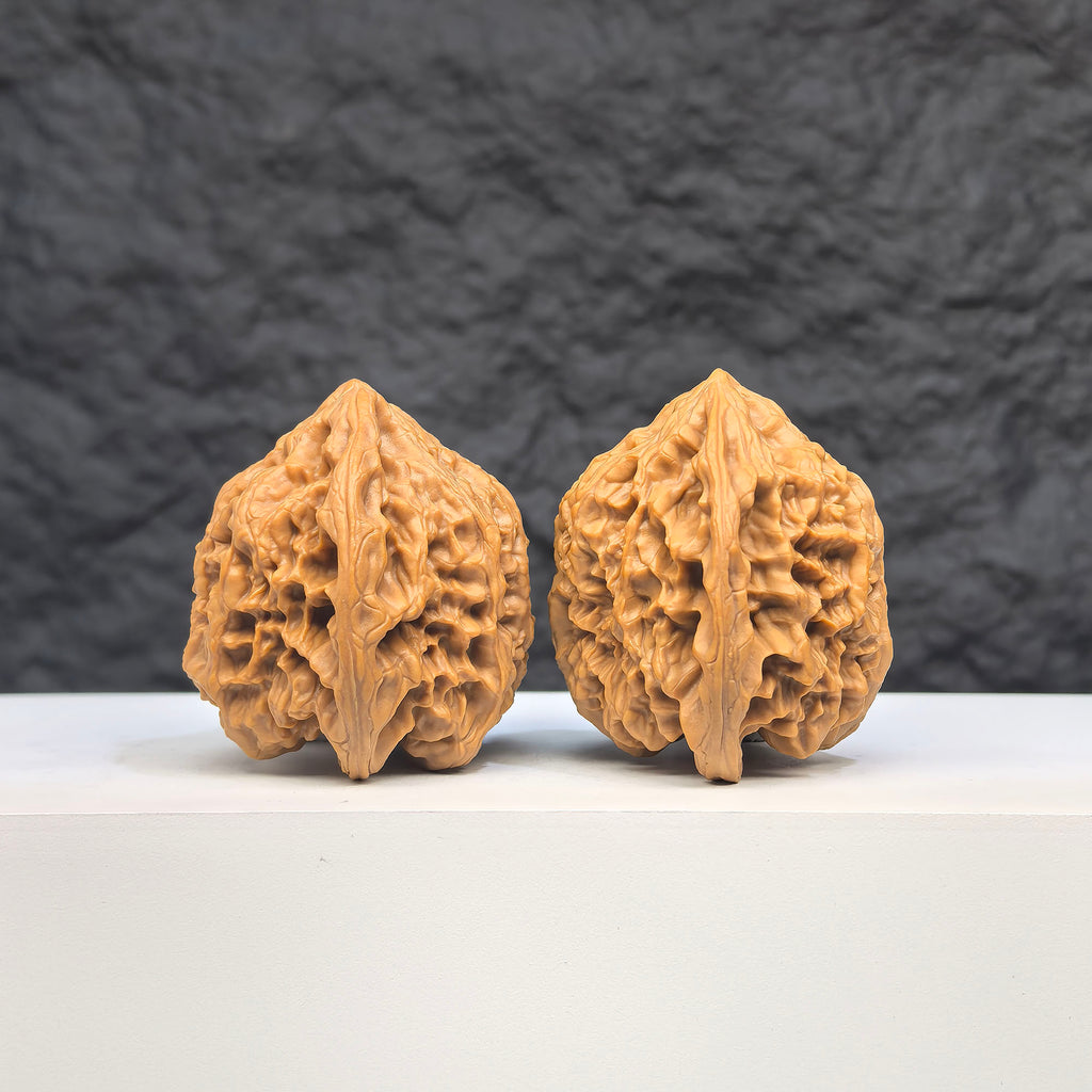 Selected grade Wild Bison Walnut Wenwan art piece, measuring 3.8×3.6cm, showcasing natural wood grain and craftsmanship.