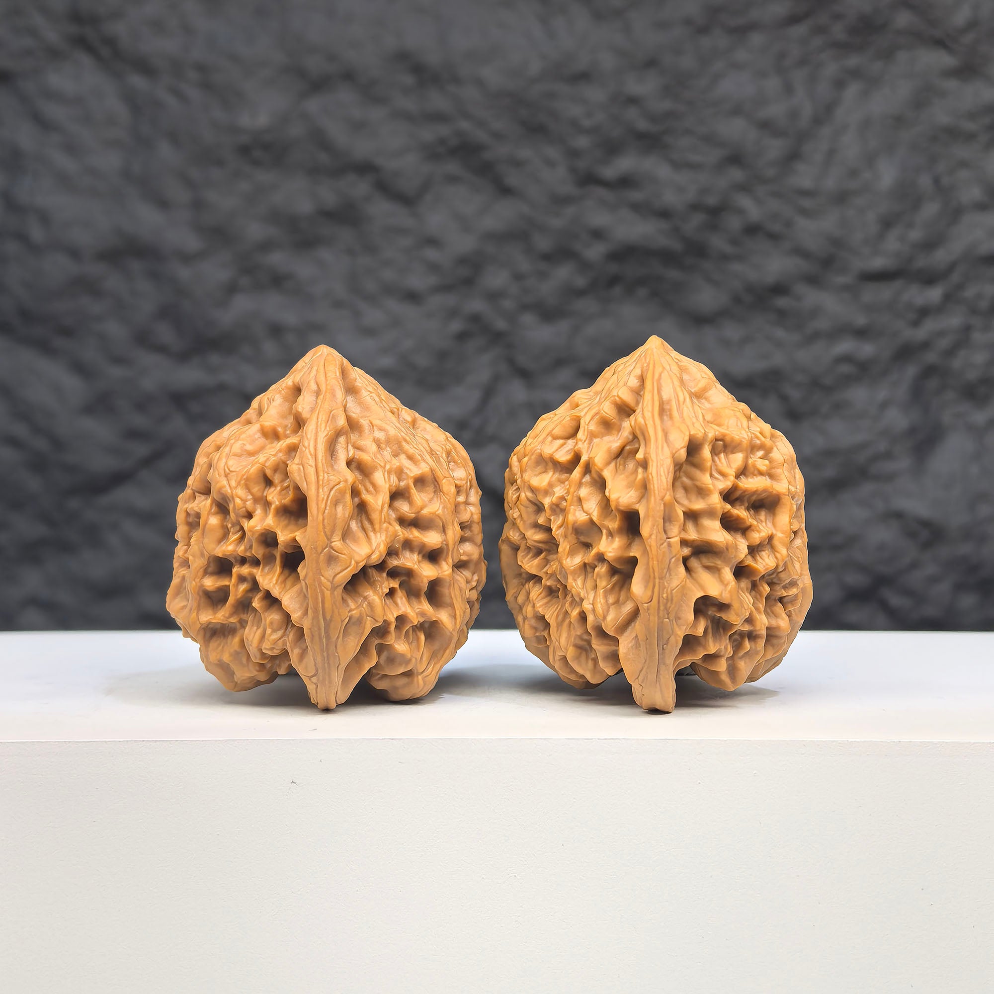 Selected grade Wild Bison Walnut Wenwan art piece, measuring 3.8×3.6cm, showcasing natural wood grain and craftsmanship.