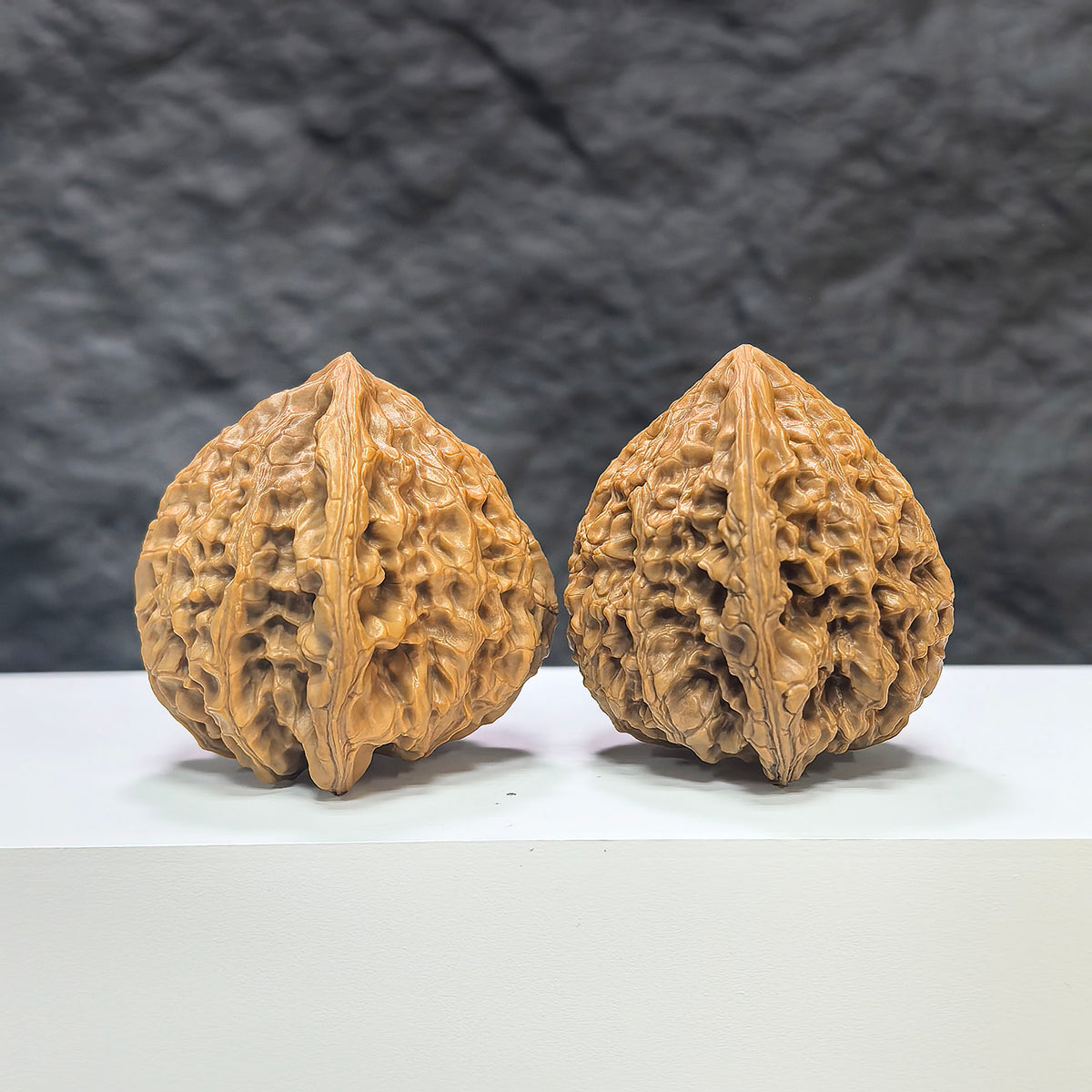 Pair of Classic Scholar Wenwan Walnuts by Wenwan Art, featuring桃心虎頭王 design, 44mm x 42mm, hand-matched walnut carvings.