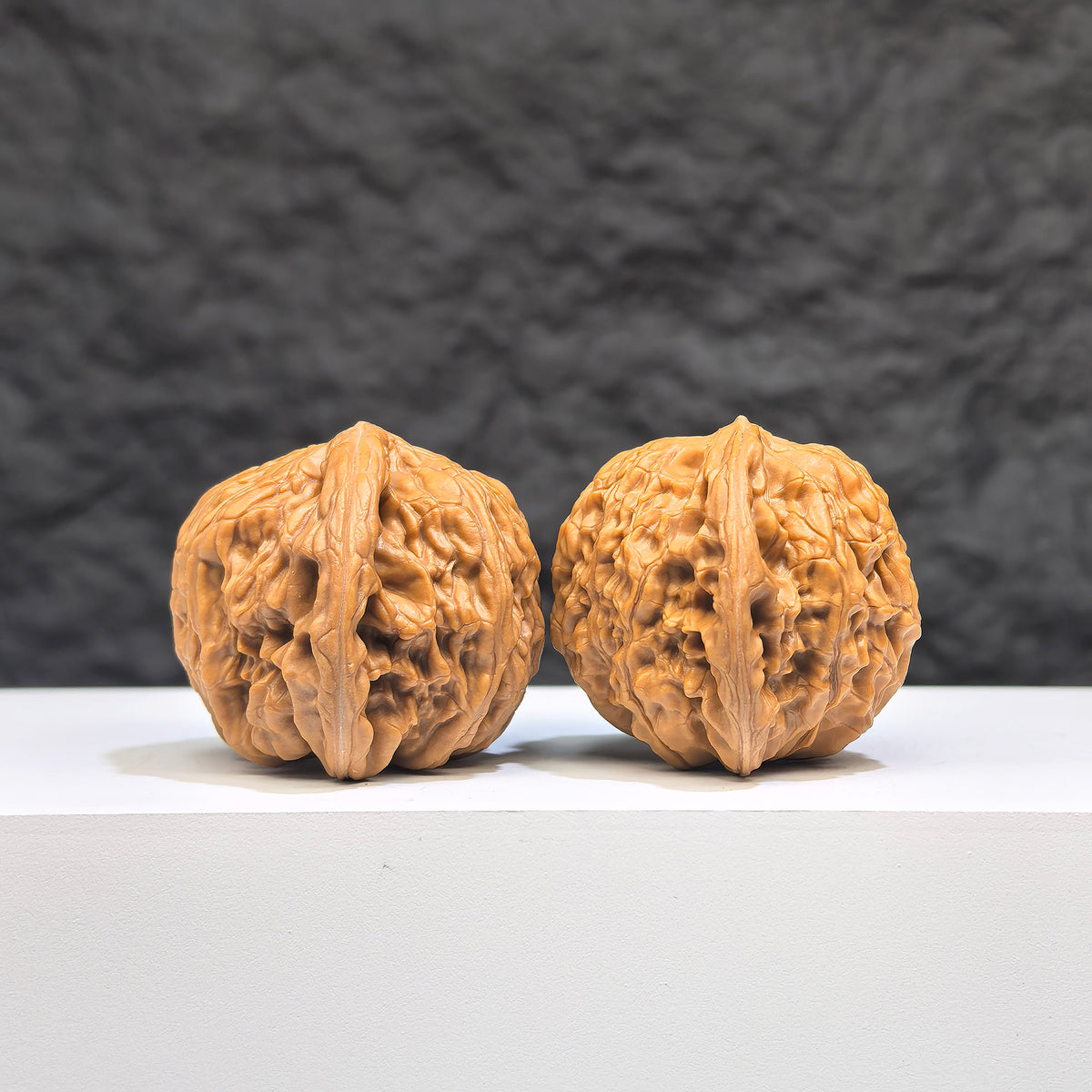 Pair of Wenwan Art Pocket Symmetrical Millstone miniatures, 36mm x 33mm, showcasing detailed miniature Wenwan walnuts.