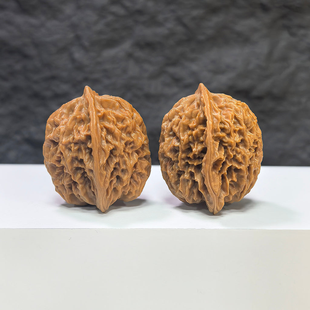 Pair of Panlong Texture Wenwan Walnuts by Wenwan Art, 34mm x 31mm, showcasing detailed natural wood grain and classic design.