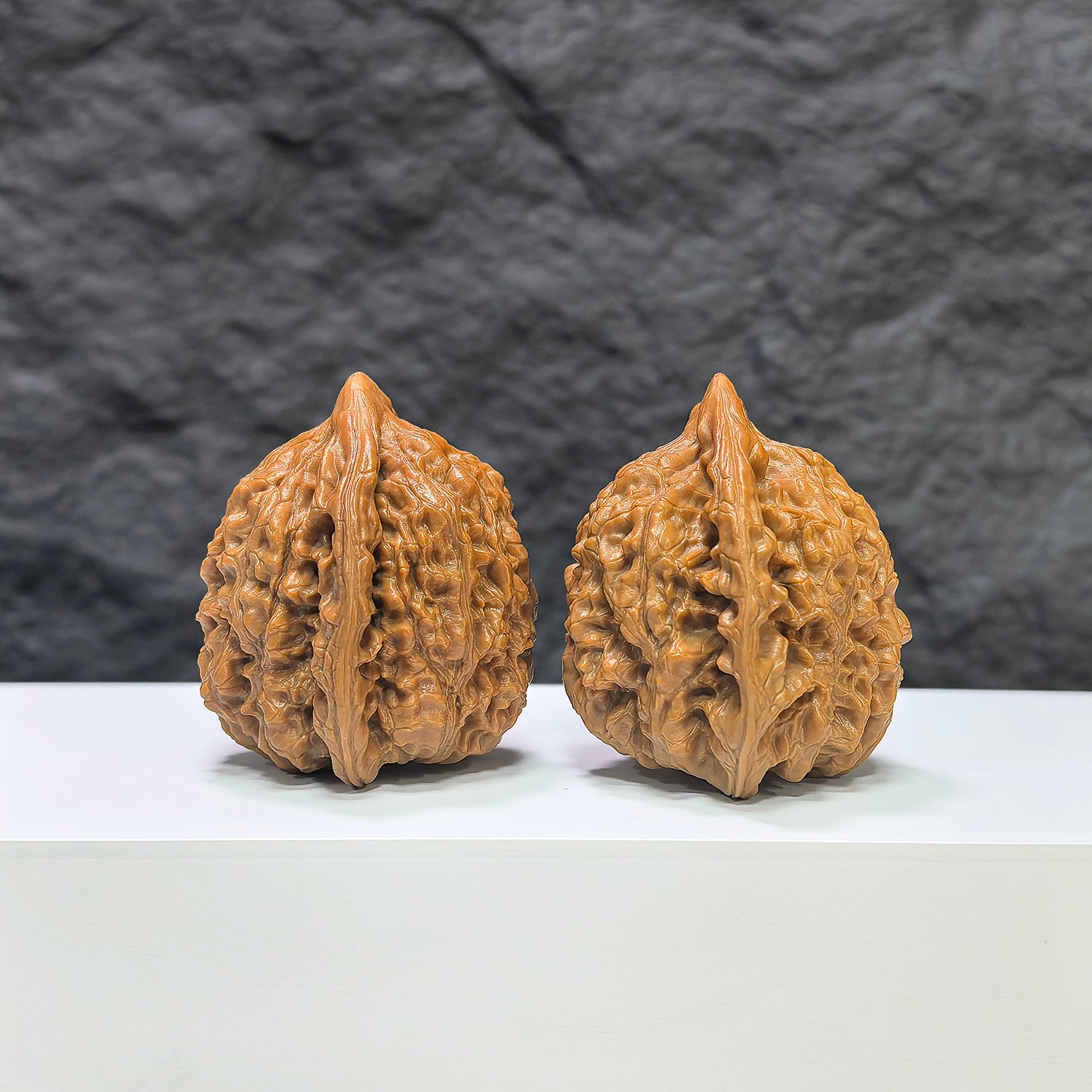 Wenwan Art Kylin Texture Classic Wenwan Walnut pair with 麒麟紋 pattern, 40mm x 37mm, detailed natural wood grain, smooth surface.