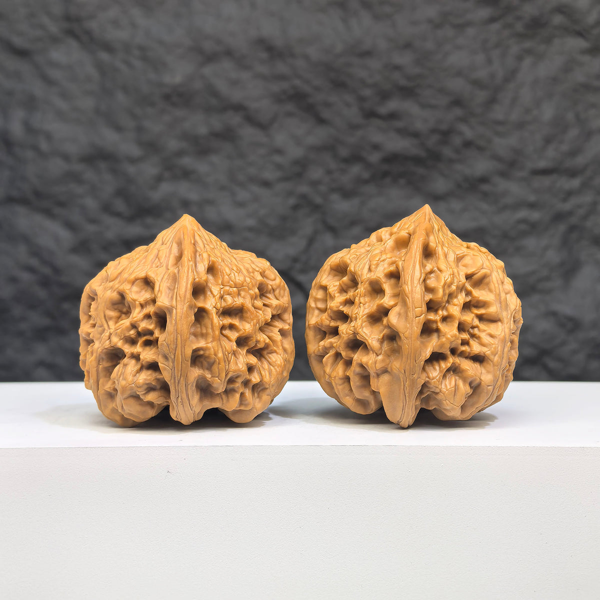 Selected grade Wild Bison Walnut from Wenwan Art, 4cm x 4cm, featuring intricate natural wood grain and smooth polished surface.