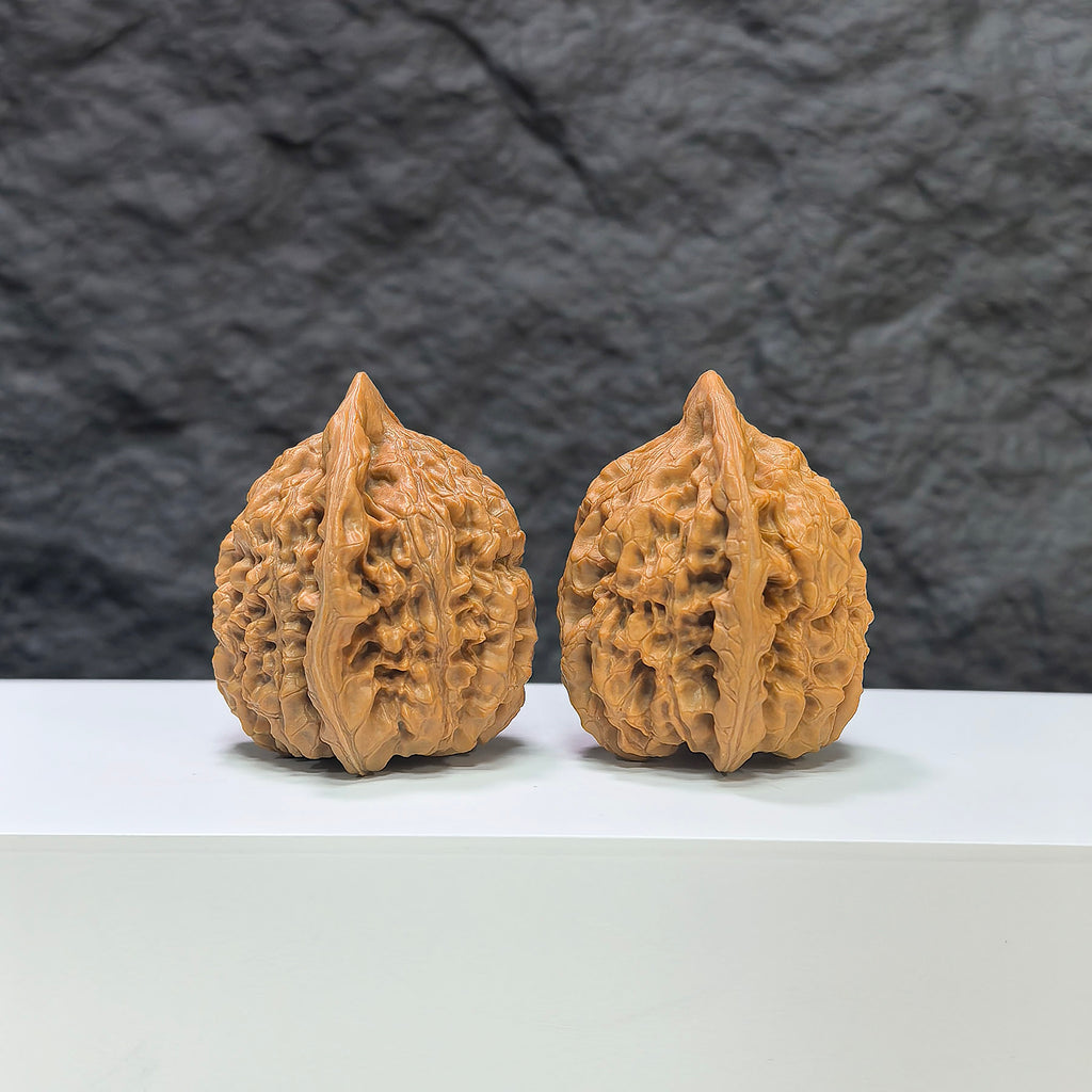 Wenwan Art Kylin Texture Classic Wenwan Walnut pair with 麒麟紋 pattern, 39mm x 35mm, showcasing detailed textured surfaces.