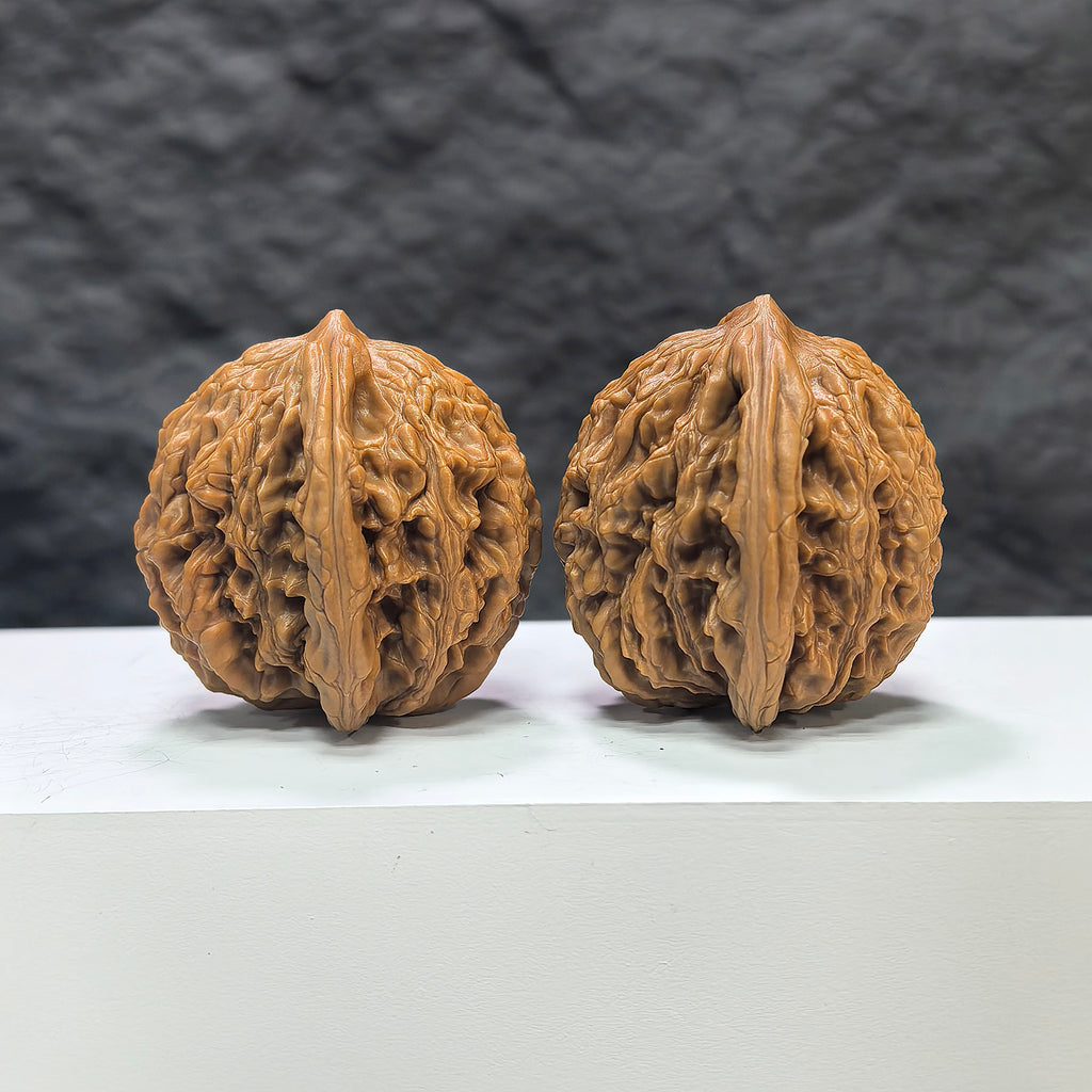 Wenwan Art Wheat Ear Tiger Head Wenwan Walnut pair, 42mm x 49mm, featuring detailed tiger head designs and wheat ear motifs.