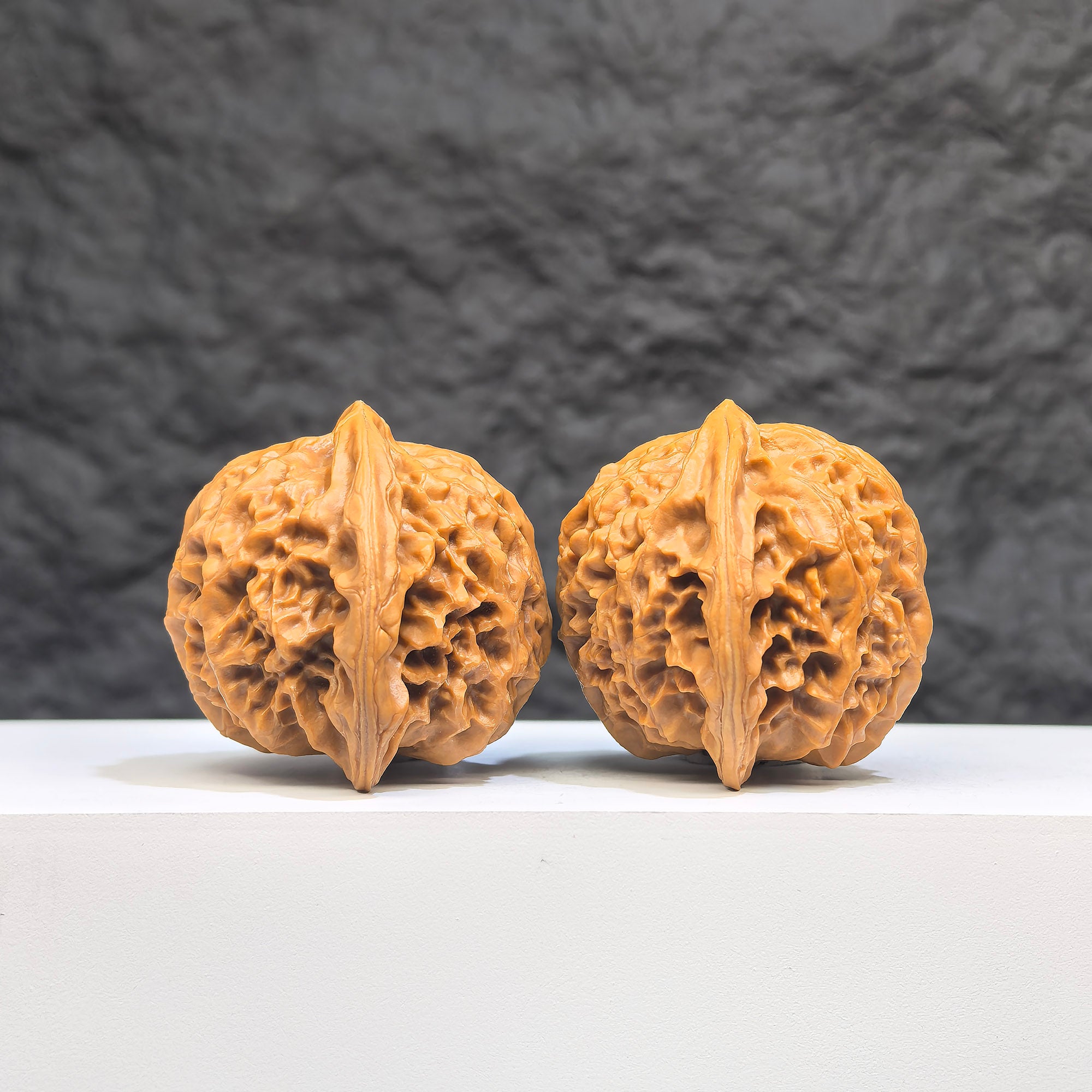 Pair of Peach Heart Palace Lantern Wenwan walnuts from Wenwan Art, featuring intricate peach heart designs, 42mm x 38mm size.