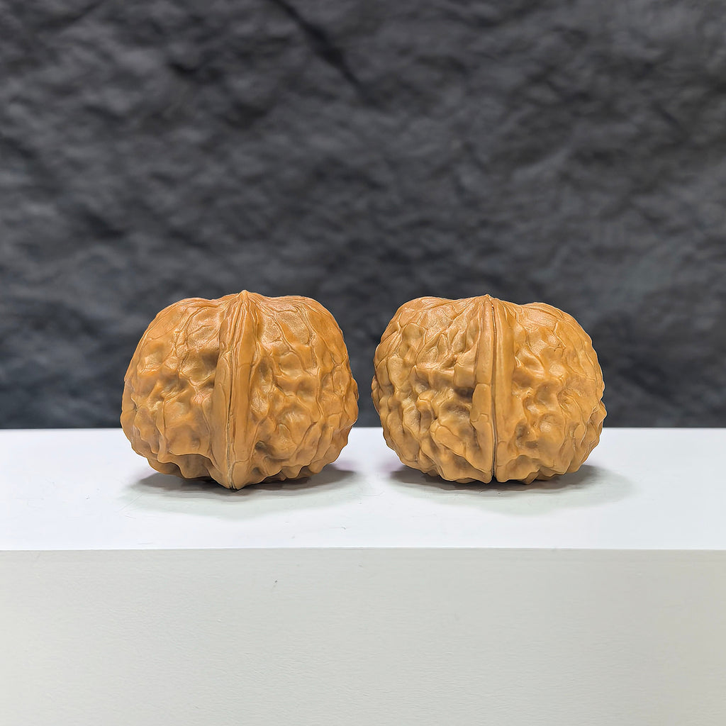 Golden Toad Vessel and Heaven Devouring Beast Wenwan walnuts pair, 36mm x 37mm, crafted by Wenwan Art, detailed natural wood grain.