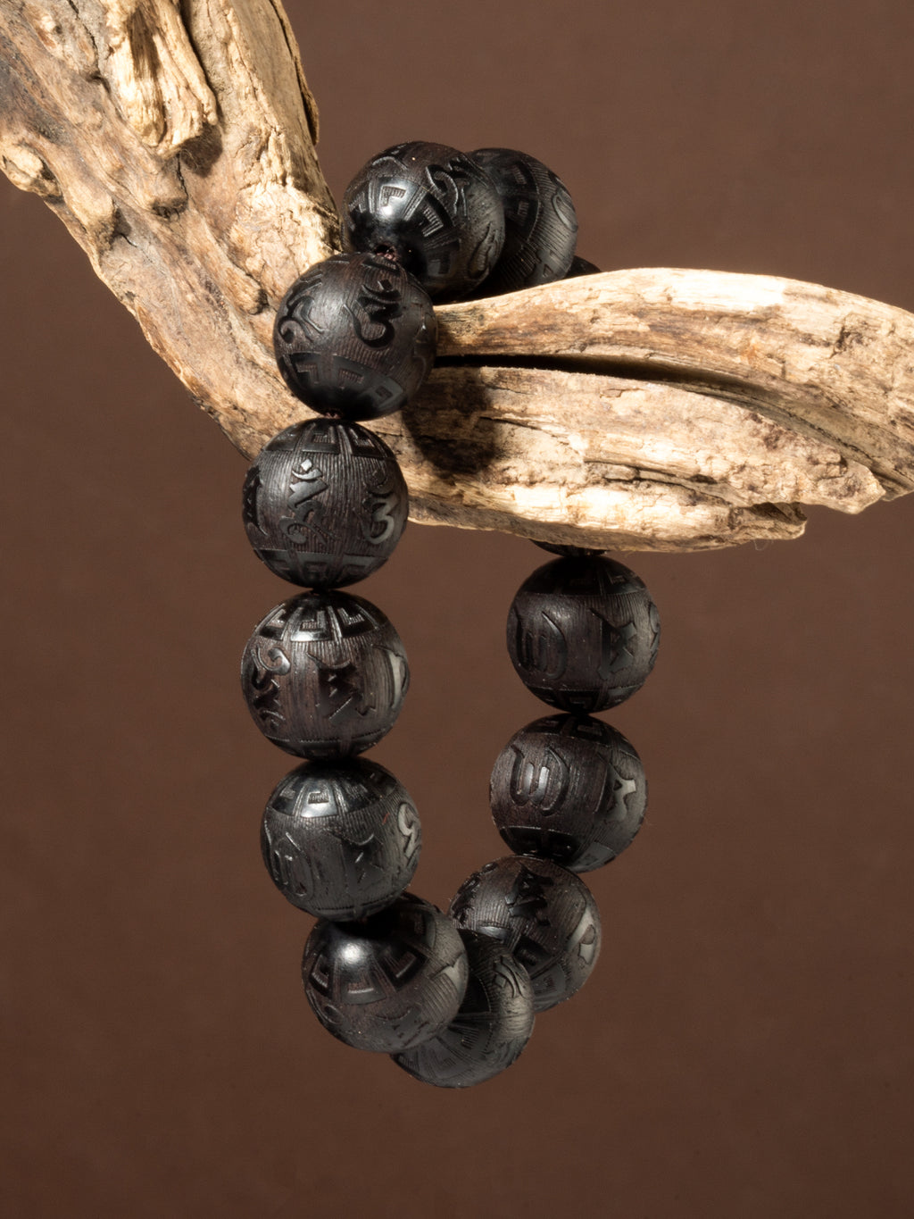 Carved ebony wood Om Mani Padme Hum bracelet with 16mm beads, featuring traditional blessing symbols, by ZenWenwan.