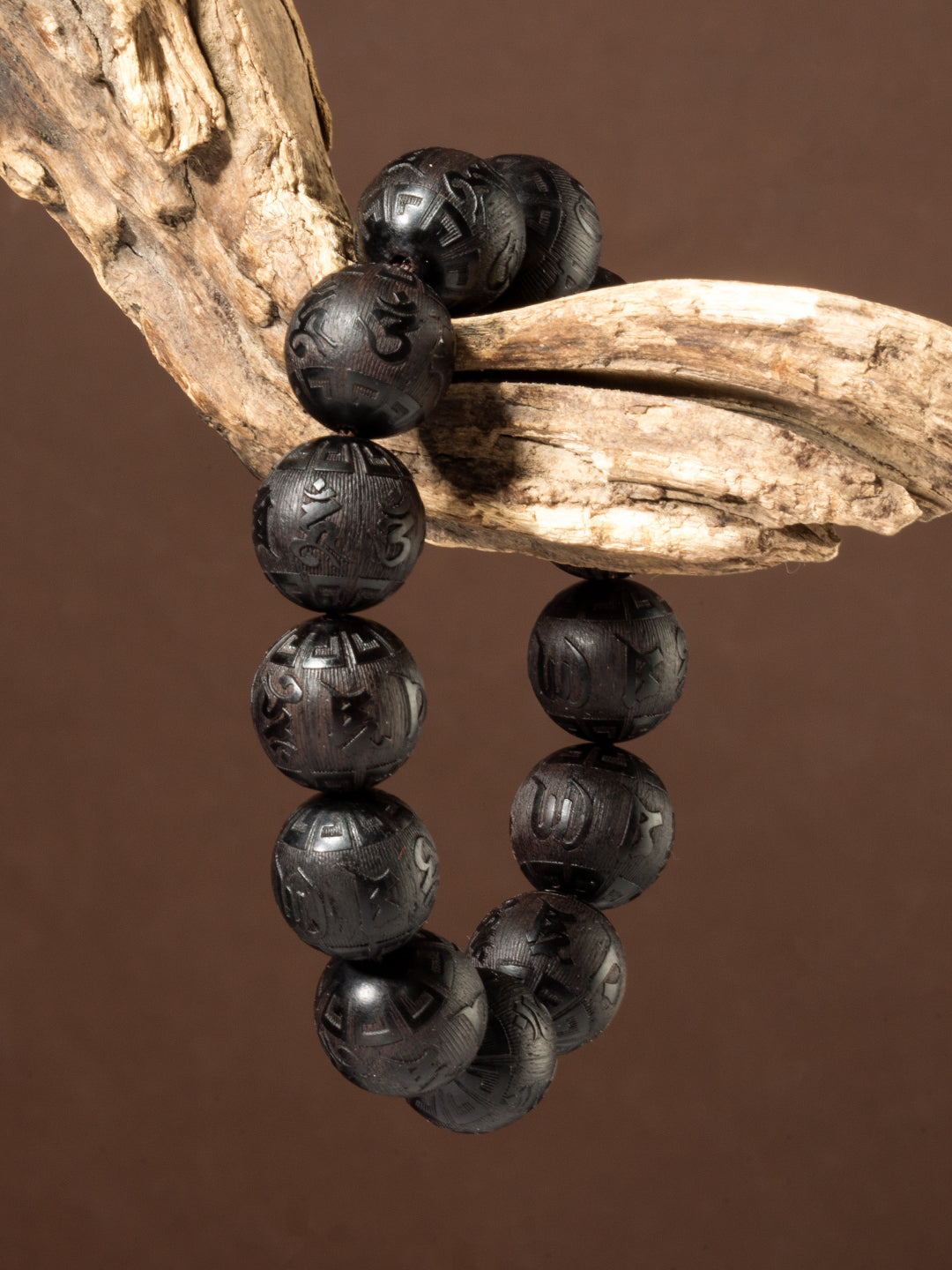 Carved ebony wood Om Mani Padme Hum bracelet with 16mm beads, featuring traditional blessing symbols, by ZenWenwan.