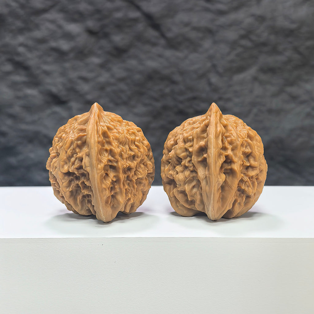 Wenwan Art Xiayunling Classic Wenwan Walnut pair, 38mm x 37mm, showing smooth, polished walnut with natural wood grain detail.