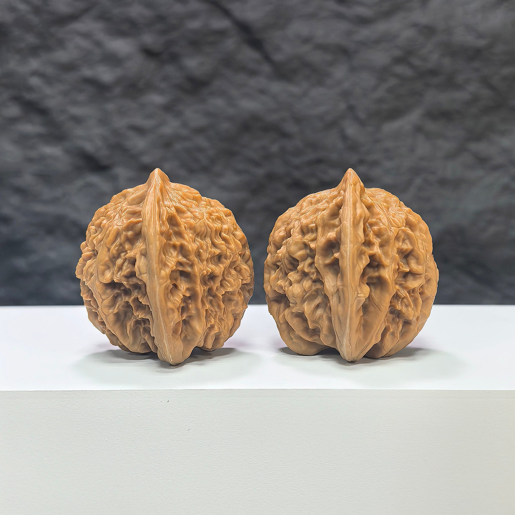 Wenwan Art Xiayunling Classic Wenwan Walnut pair, 38mm x 37mm, showing smooth, polished walnut with natural wood grain detail.
