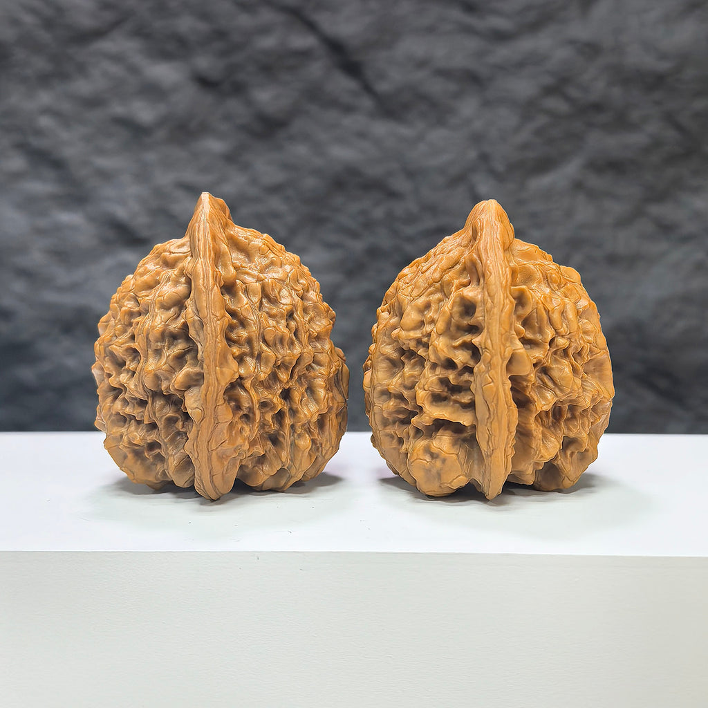 Official Wenwan Art walnut pair featuring classic官帽 design, 44mm x 41mm, showcasing detailed craftsmanship and natural walnut texture.