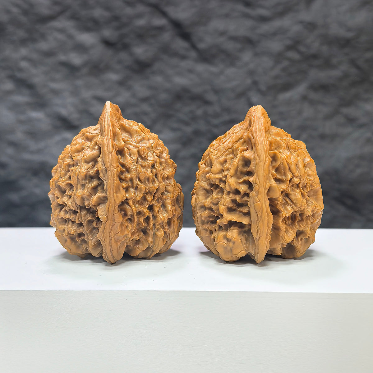 Official Wenwan Art walnut pair featuring classic官帽 design, 44mm x 41mm, showcasing detailed craftsmanship and natural walnut texture.