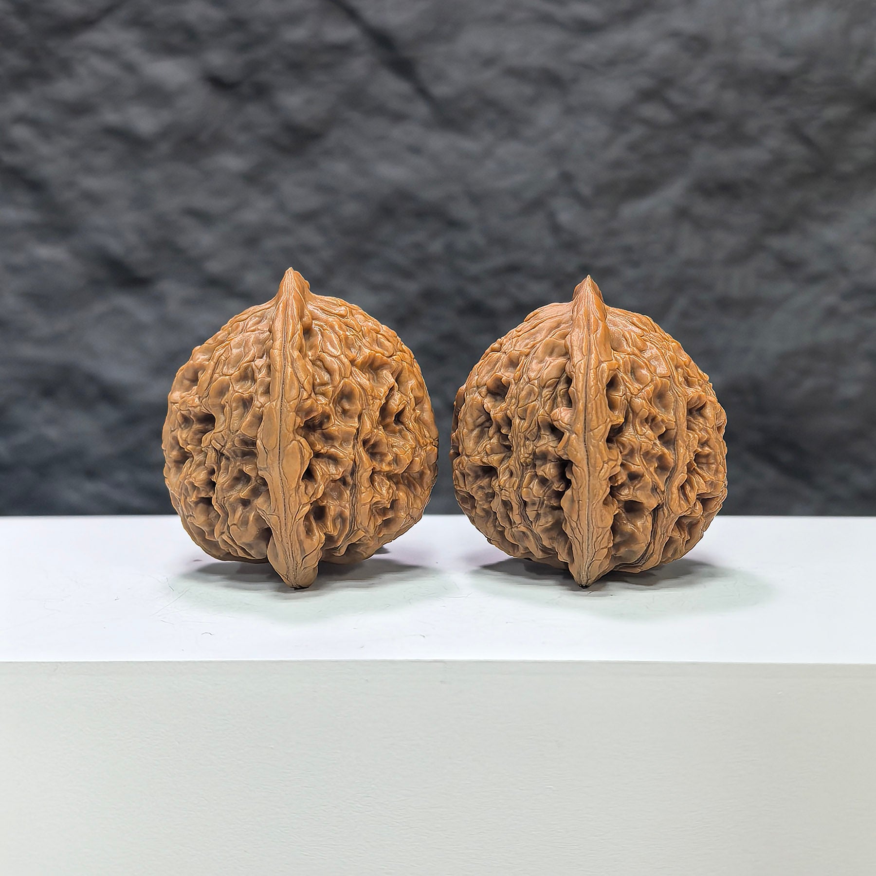 Pair of Wenwan Art Water Dragon Texture Classic Wenwan Walnuts, 37mm x 36mm, featuring intricate dragon pattern on smooth walnut surfaces.