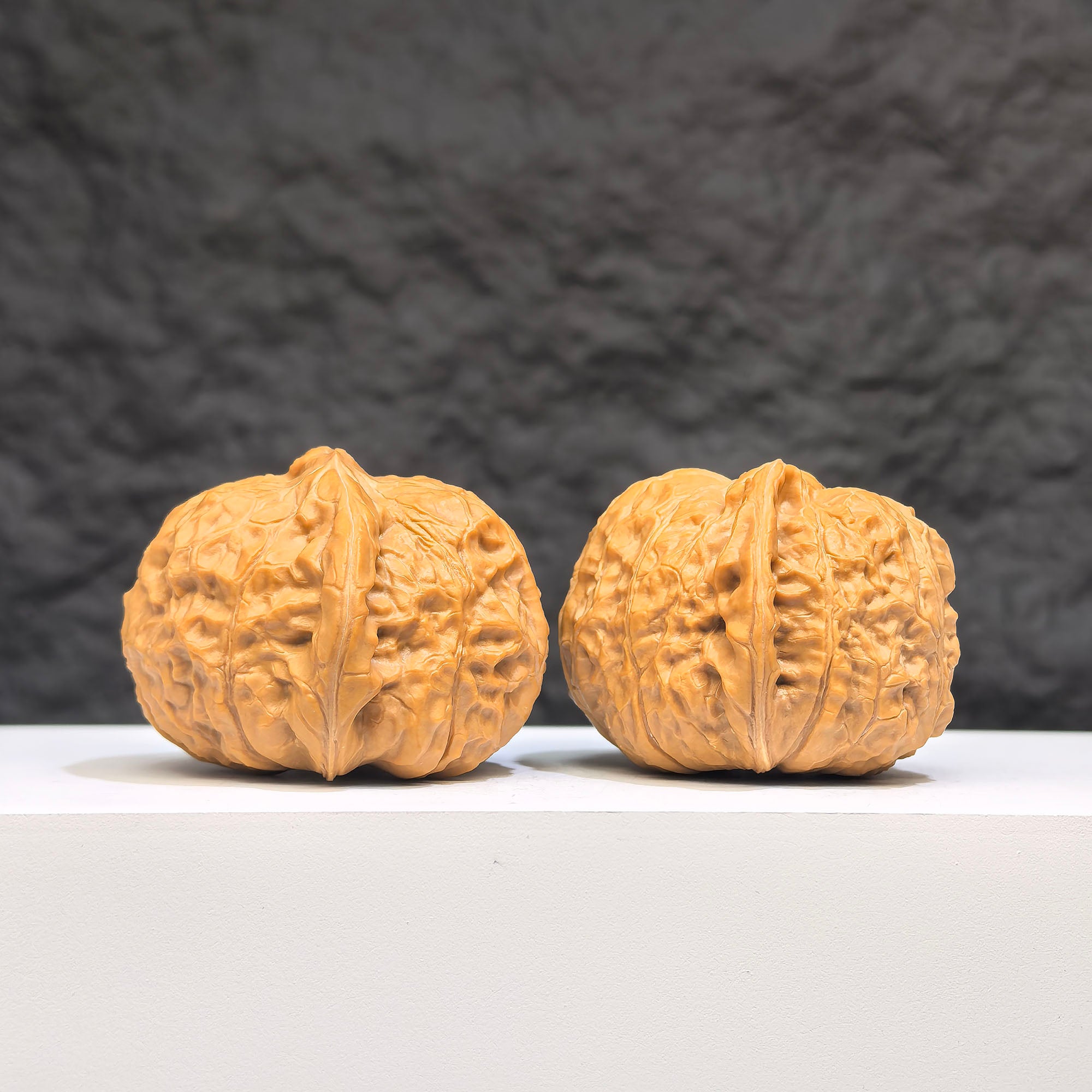 Wenwan Art Hundred Beasts Lion Head Wenwan Walnut pair, 43x40mm, featuring detailed lion head carvings on natural walnuts.