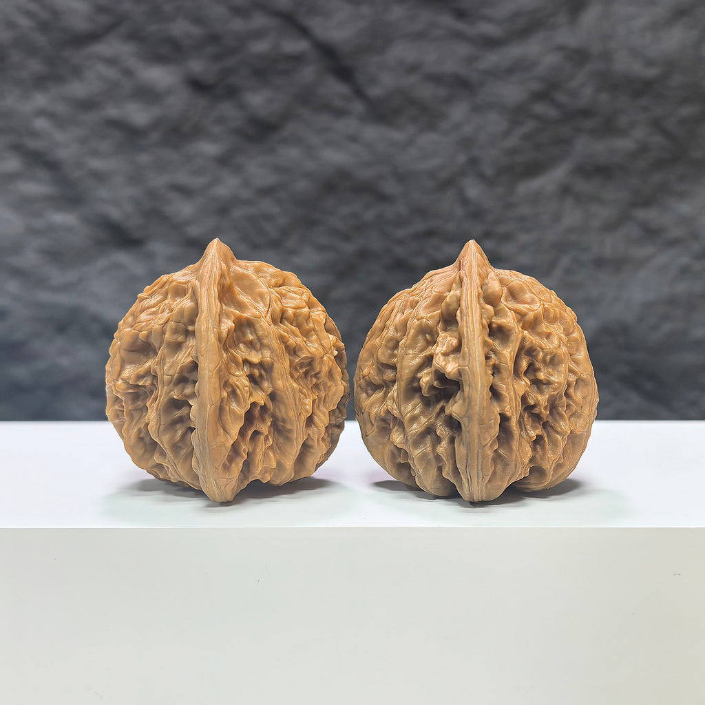 Pair of Peach Heart Xiayunling Wenwan walnuts from Wenwan Art, 41mm x 39mm, showcasing smooth, polished walnut shells with peach heart shape.