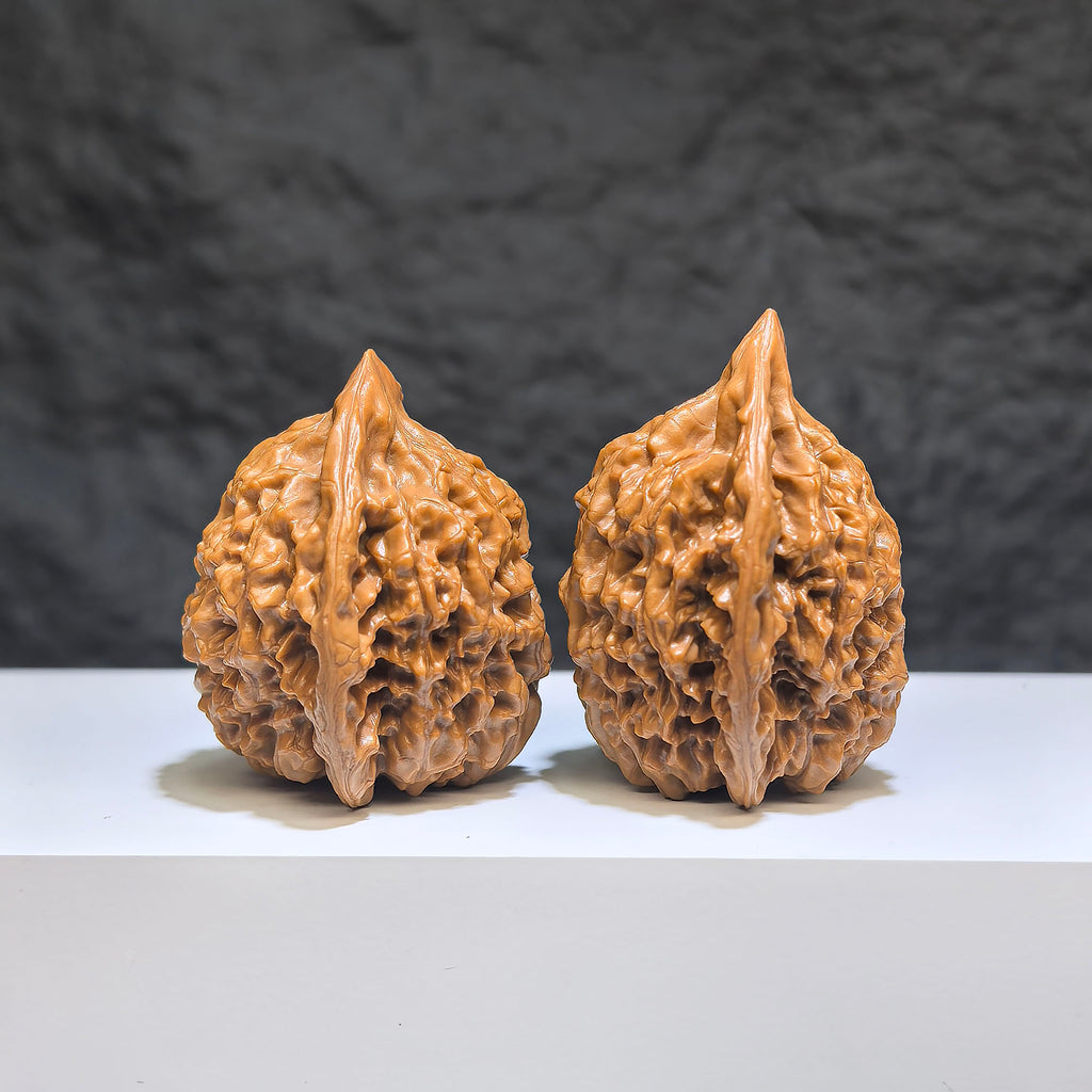 Pair of small Wenwan walnut miniatures from Wenwan Art, featuring detailed craftsmanship and measuring approximately 34mm x 33mm.