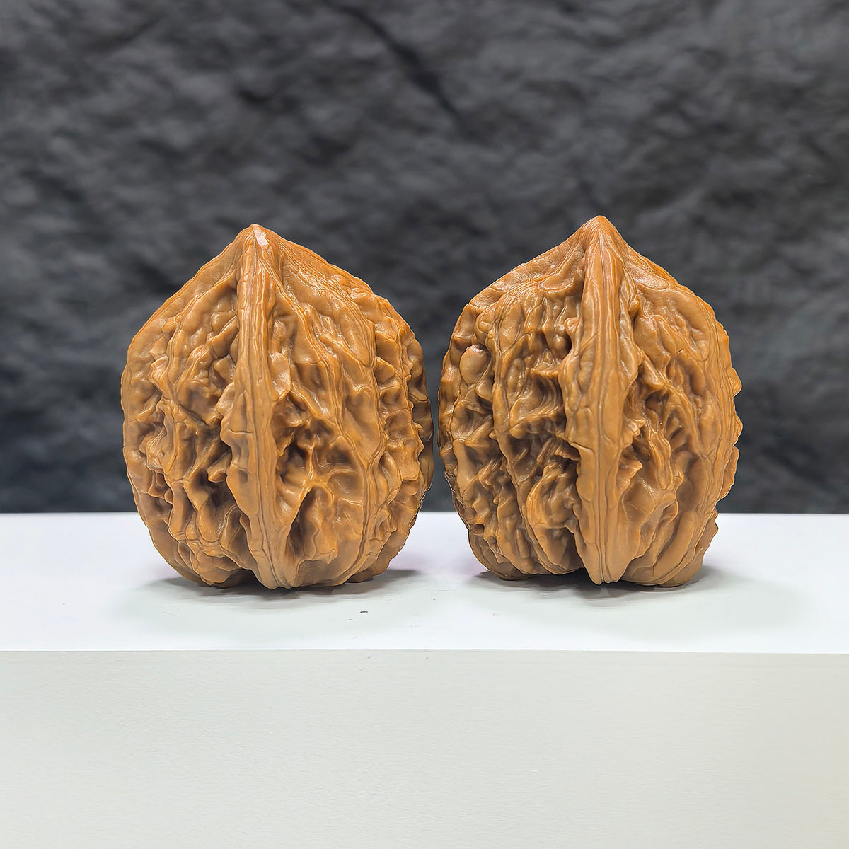 Pair of Classic Scholar Wenwan walnuts by Wenwan Art, hand-matched with Beijing chicken heart pattern, 42mm x 40mm.