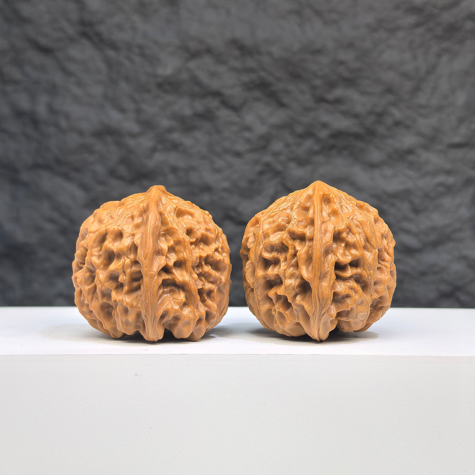 Selected grade Wild Bison Walnut for Wenwan art, measuring 3.8×3.7cm, showcasing smooth, polished walnut with natural grain details.