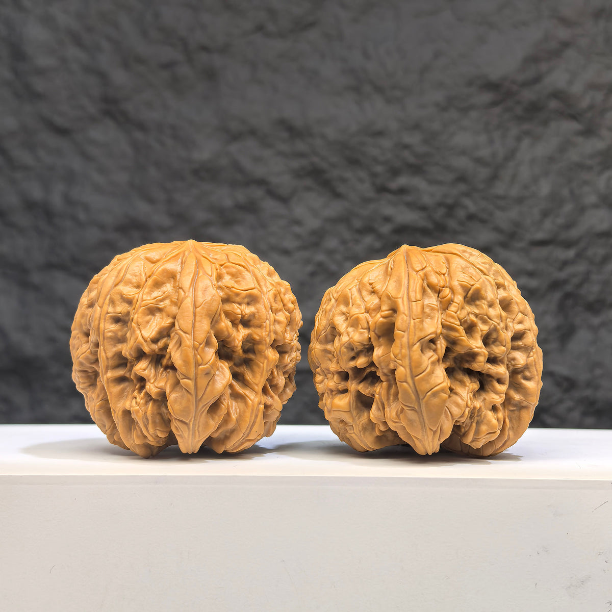 Selected grade Blizzard Wenwan Walnut, 4.3×4.4cm, showcasing smooth, polished surface and natural wood grain details.