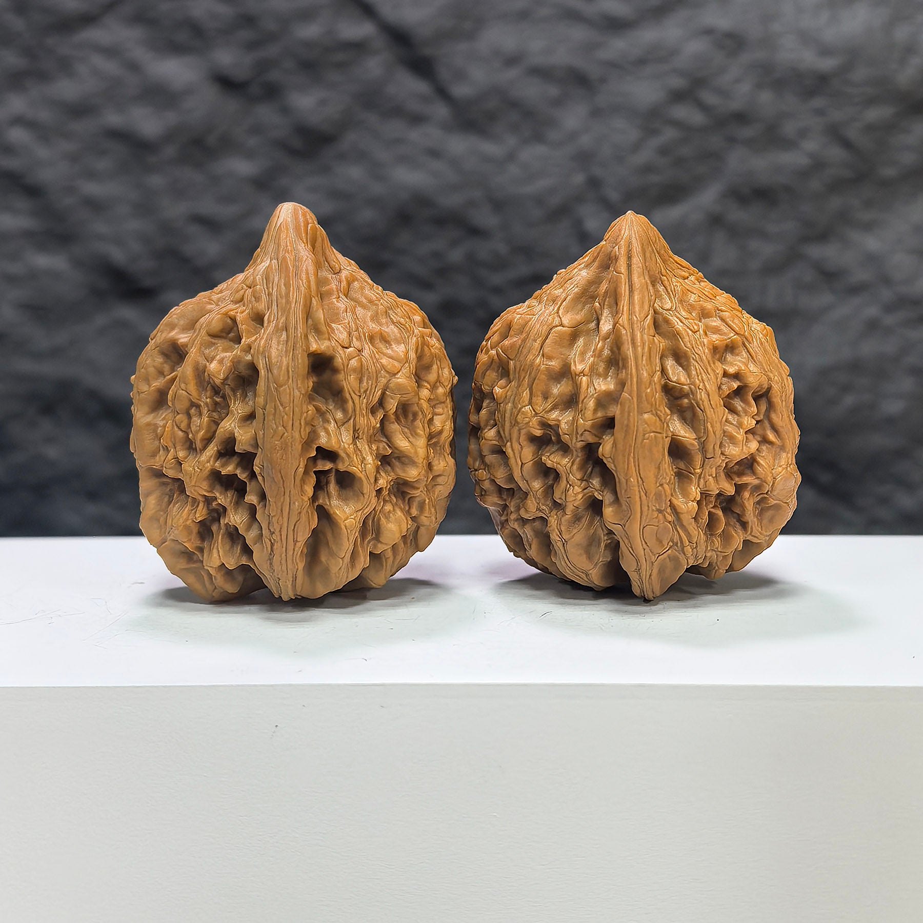 Pair of Dazhan Stone Wenwan walnuts by Wenwan Art, featuring 41mm x 42mm classic carved walnut ornaments.