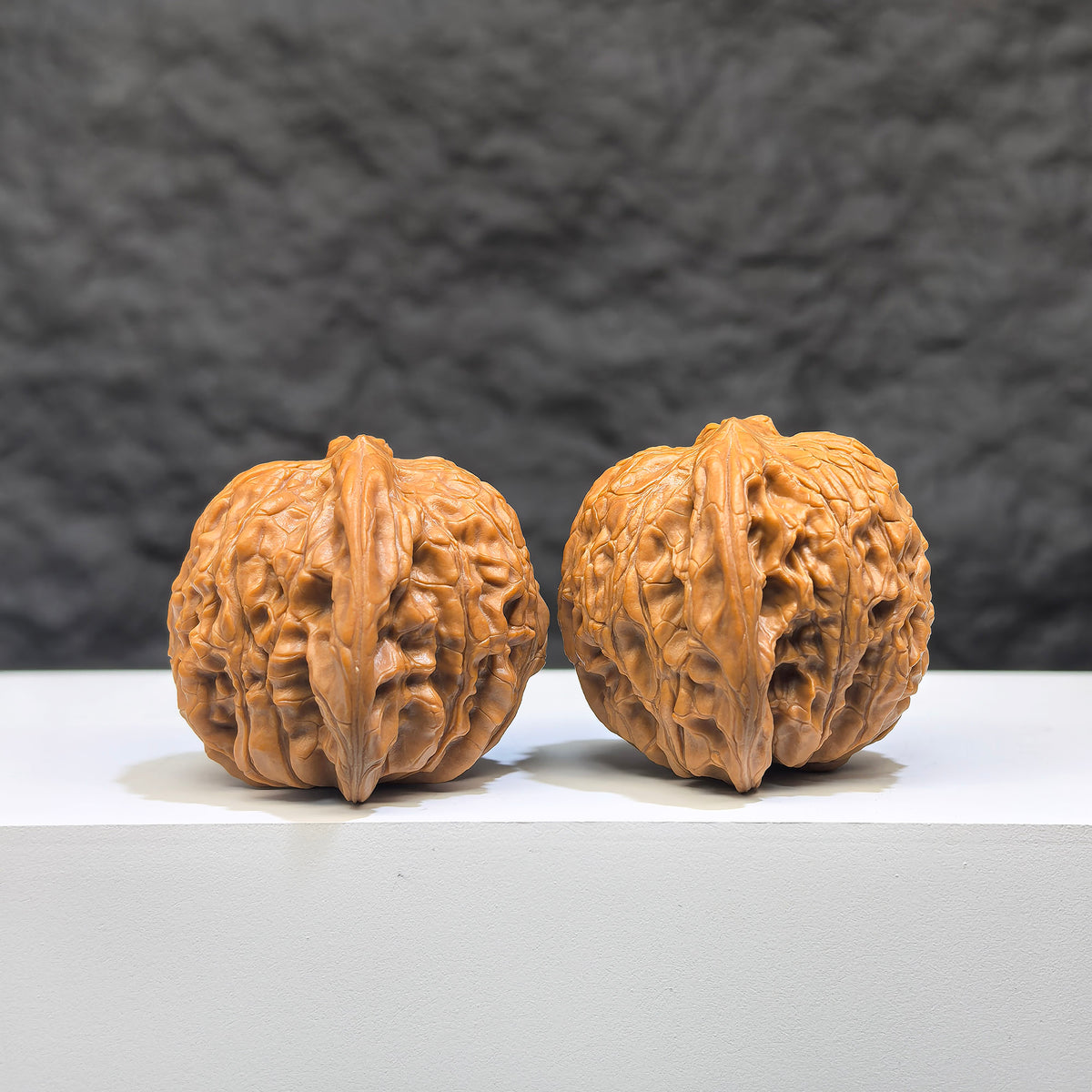 Wenwan Art Millstone Classic Wenwan Walnut pair, 38mm x 34mm, featuring smooth polished surfaces and natural walnut textures.