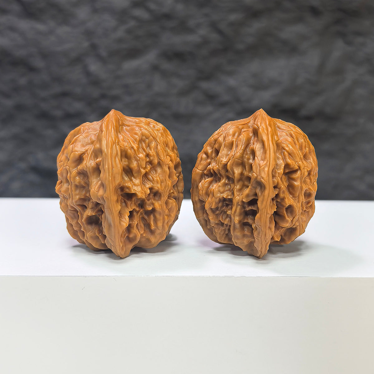 Wuling Mountain Pocket Wenwan Walnut pair by Wenwan Art, miniature 35mm x 32mm, showcasing detailed natural walnut carvings.