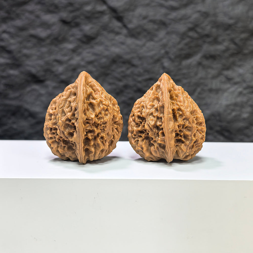 Pair of Golden Kylin Wenwan walnuts from Wenwan Art, featuring intricate carvings and 36mm size, traditional Chinese collectible.