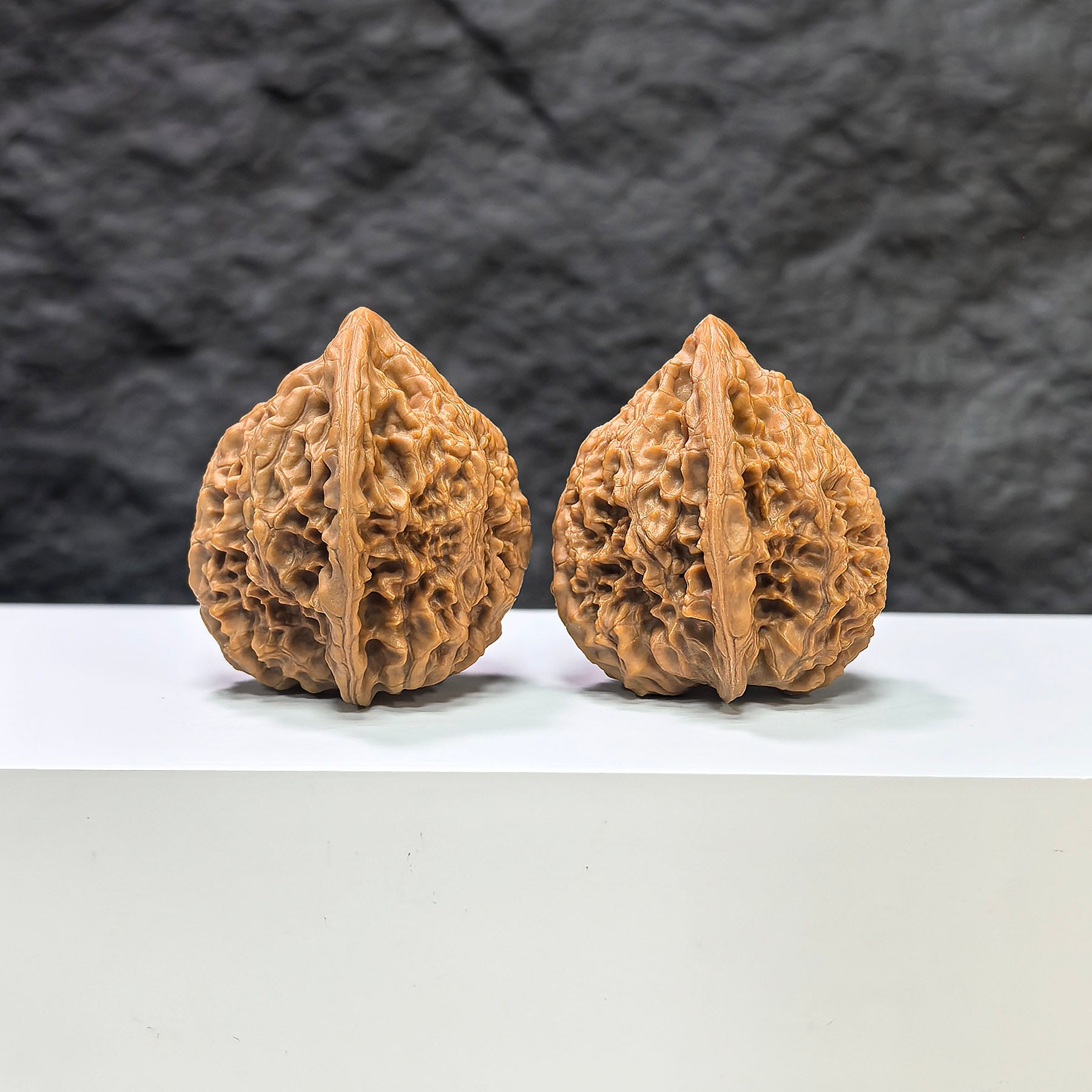 Pair of Golden Kylin Wenwan walnuts from Wenwan Art, featuring intricate carvings and 36mm size, traditional Chinese collectible.