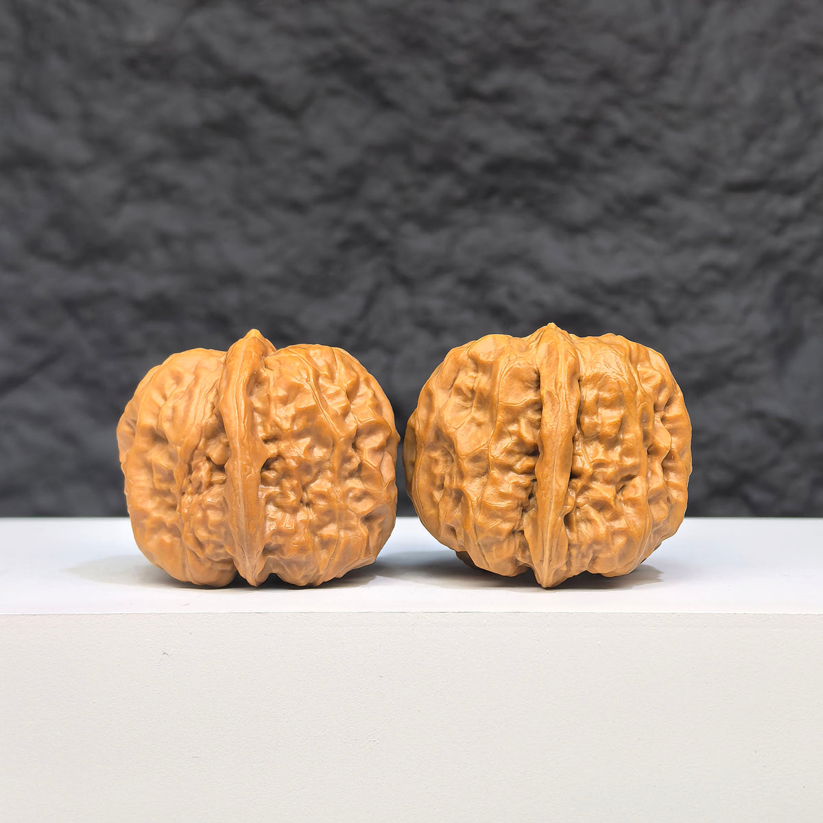 Pair of Toad Crystal Frog Wenwan Walnut carvings by Wenwan Art, featuring detailed frog and toad crystal textures, 32mm x 34mm.
