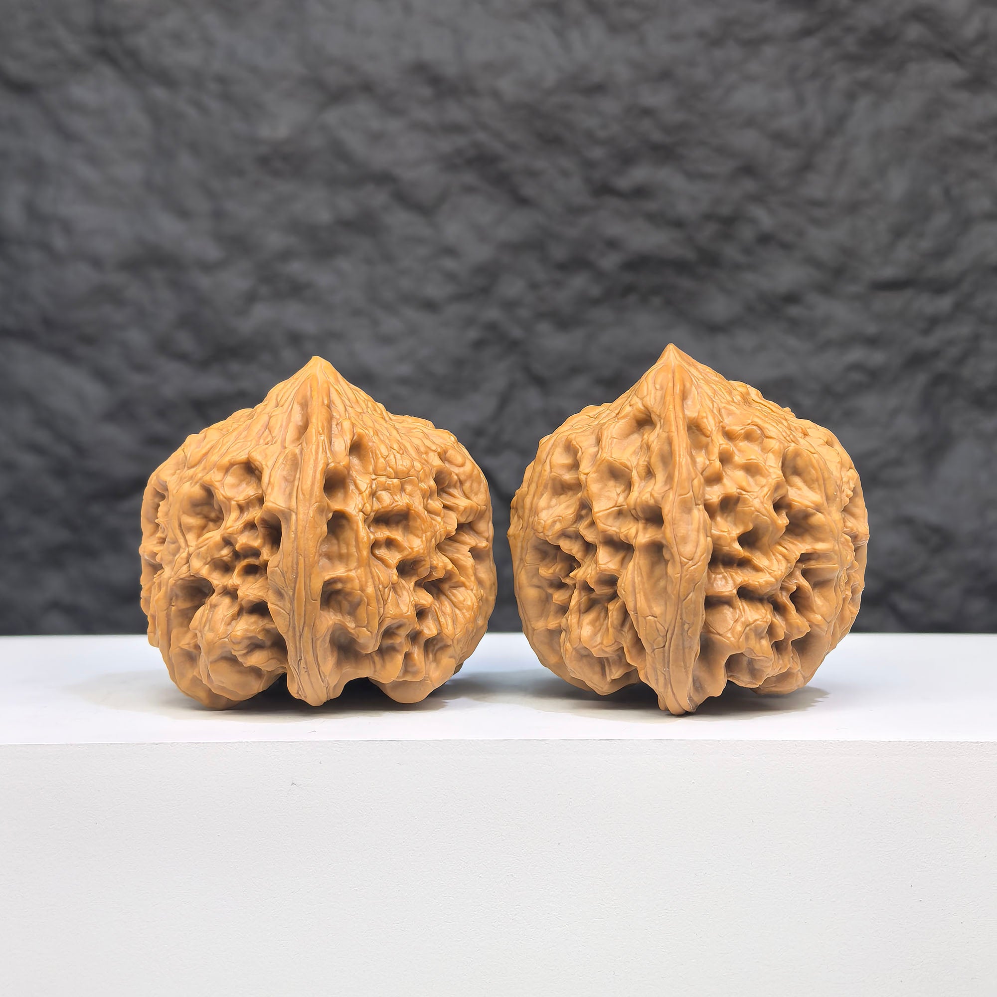 Selected grade Wild Bison Walnut Wenwan art piece, 4x4cm, showcasing natural wood grain and smooth polished surface.
