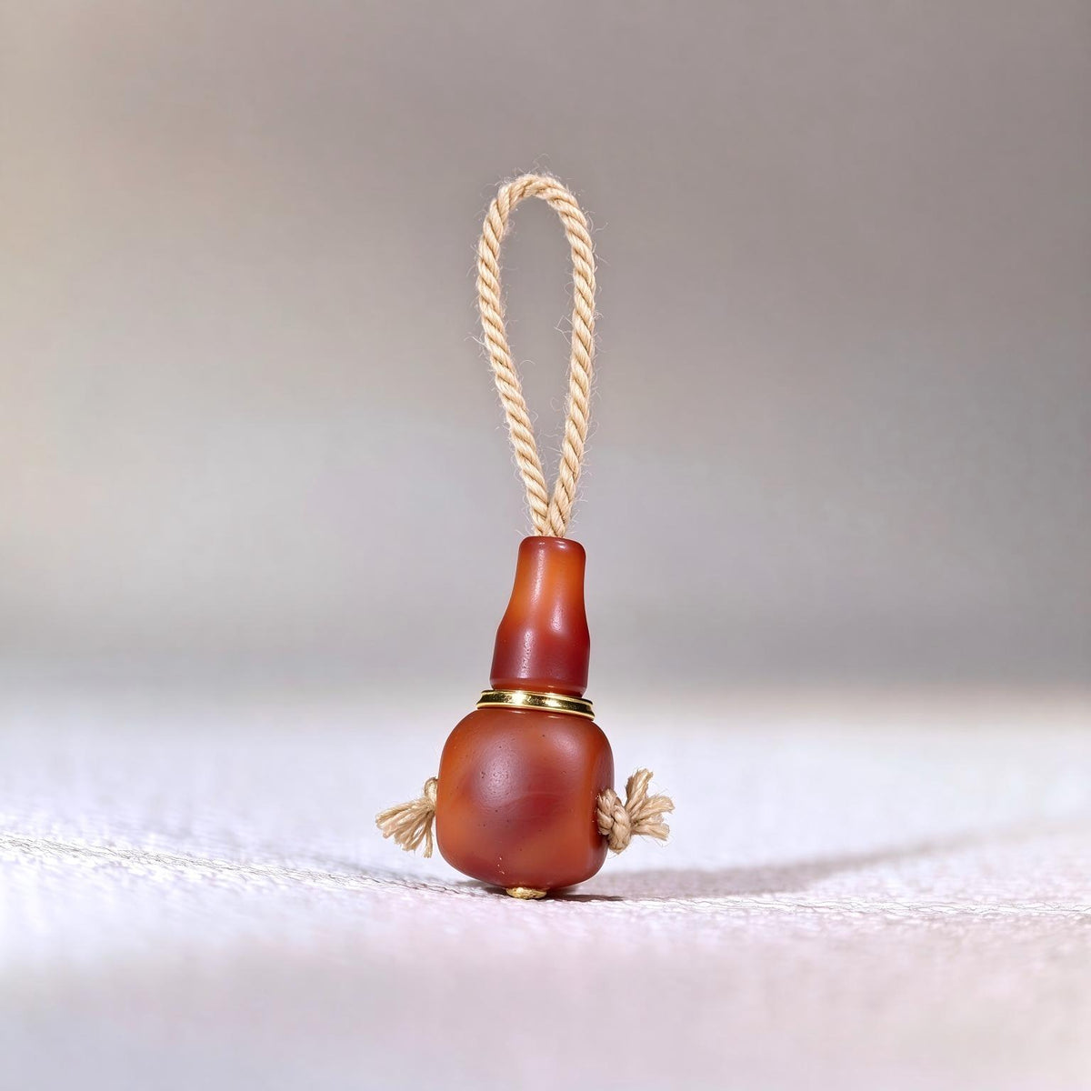 ST-10 | Red Agate Guru Bead - 10.6 mm