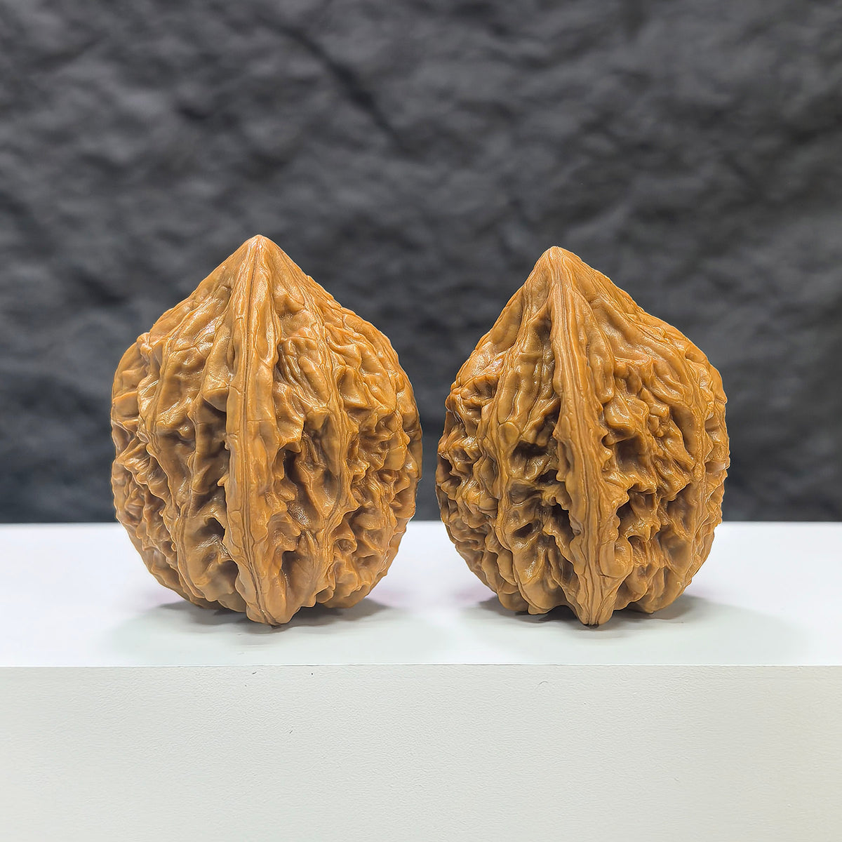 Pair of Beijing Chicken Heart Wenwan walnuts from Wenwan Art, 39mm size, featuring intricate natural wood grain and smooth polished surfaces.