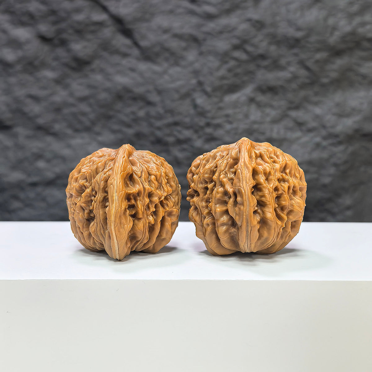 Pair of Sizuolou Classic Wenwan Walnuts by Wenwan Art, featuring natural wood grain and smooth surface, 41mm x 37mm size.