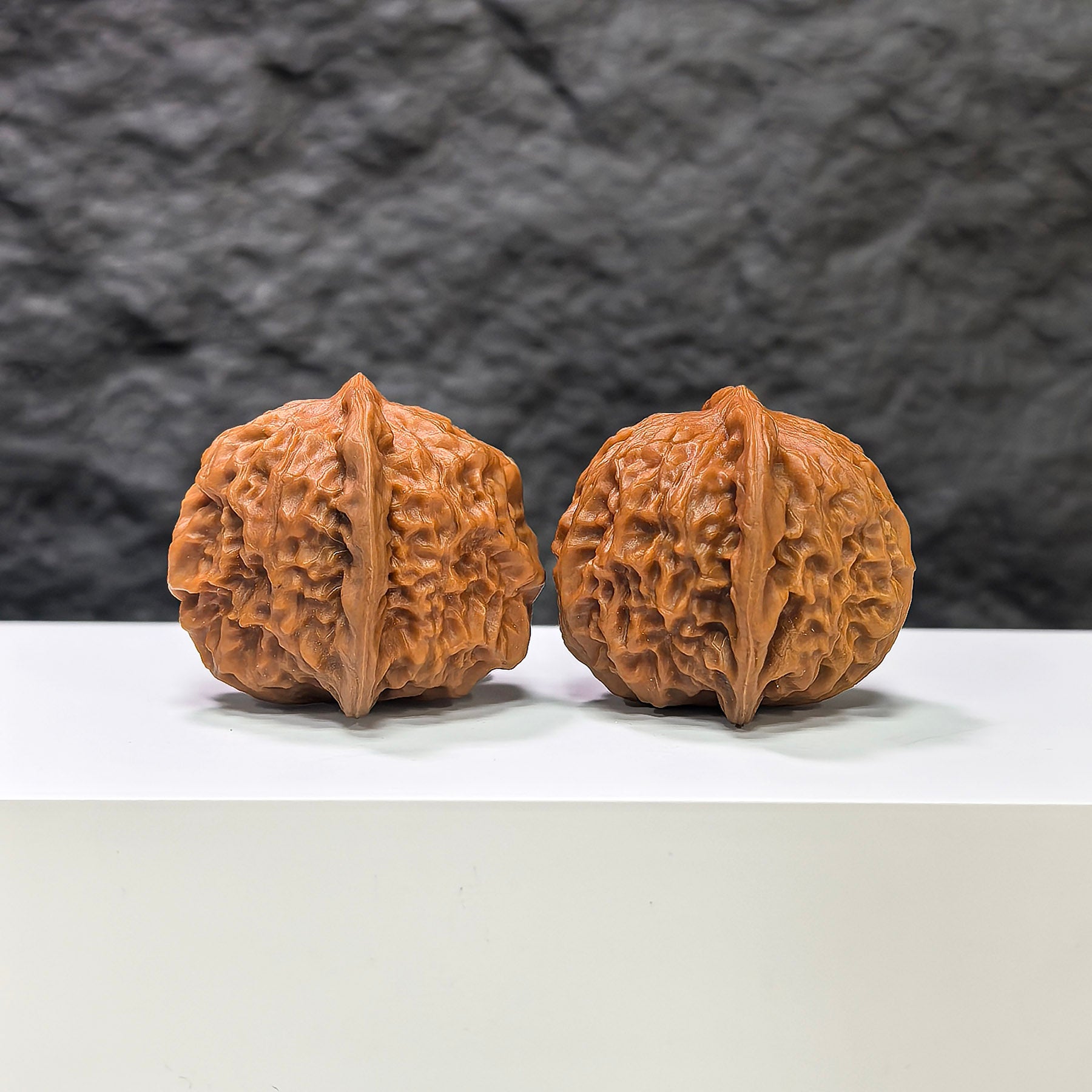 Pair of porcelain doll Wenwan walnuts by Wenwan Art, smooth-glaze ceramic walnuts featuring detailed doll designs, 38mm size.