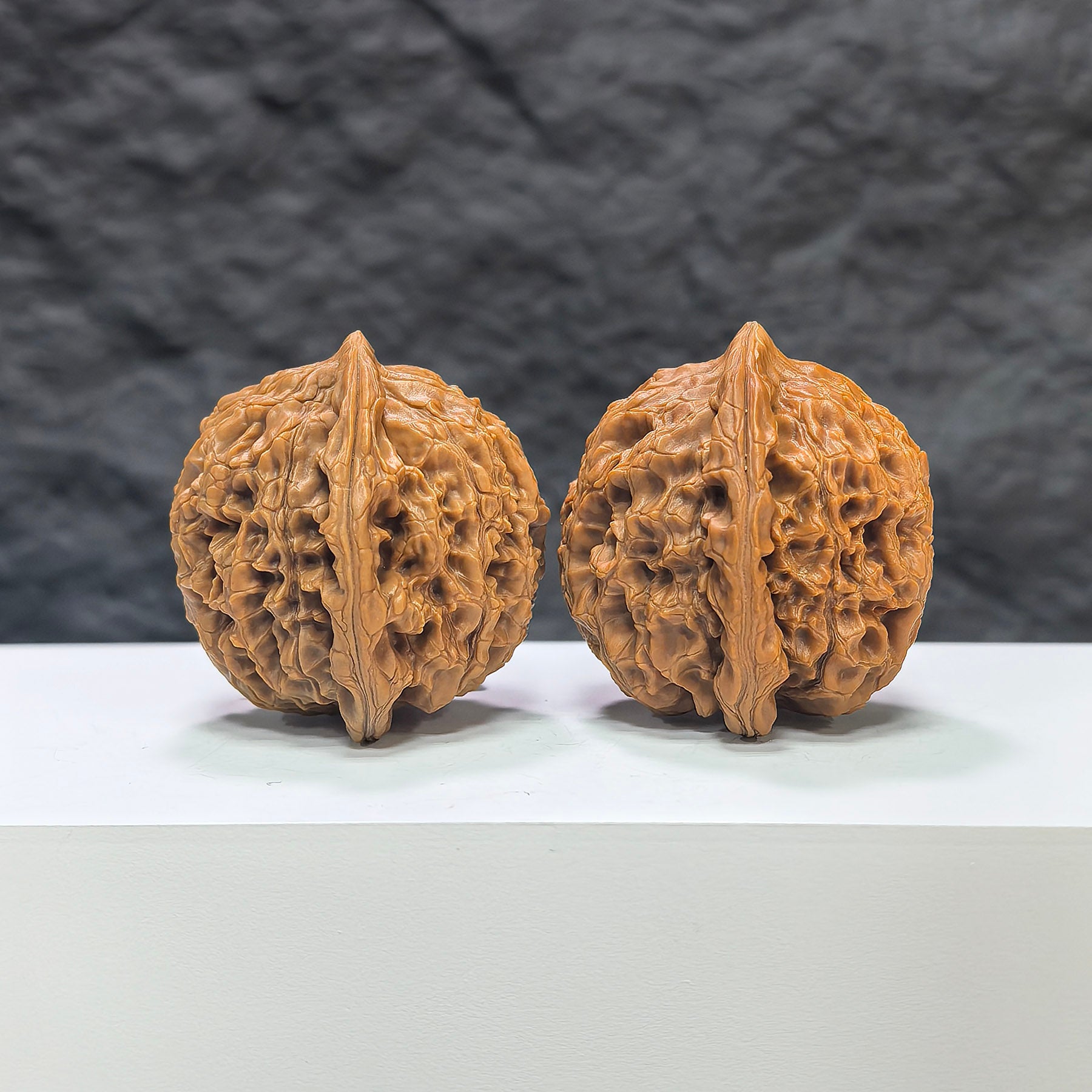 Pair of Water Dragon Texture Wenwan Walnuts from Wenwan Art, 40mm size, showcasing intricate water dragon pattern on smooth walnut surfaces.