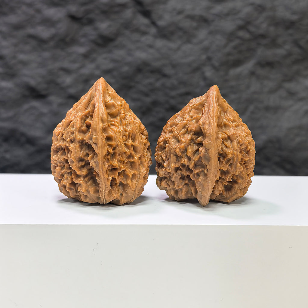 Golden Kylin Wenwan Walnut pair from Wenwan Art, 37mm x 36mm, showcasing detailed carvings and natural walnut wood texture.