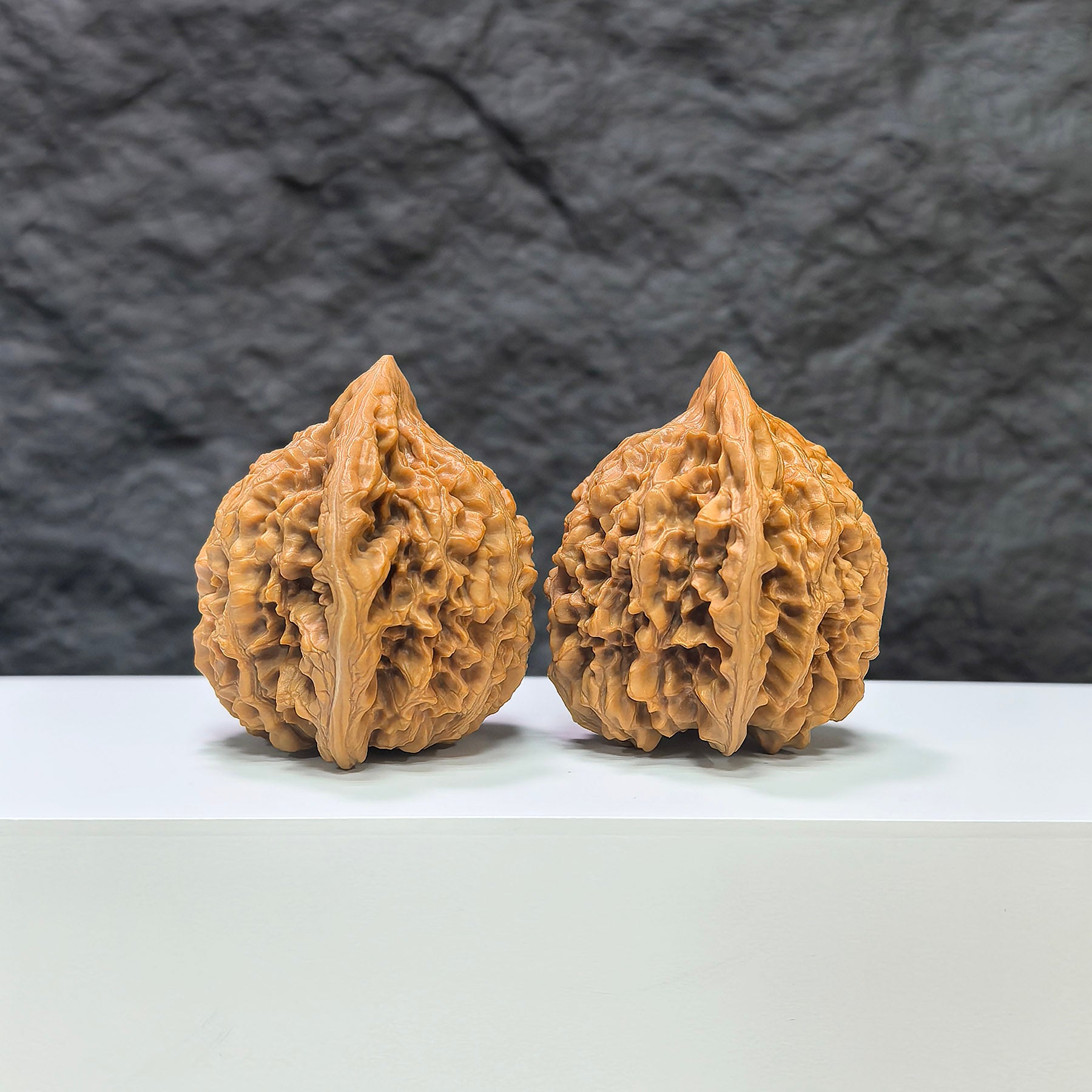 Pair of large Wenwan Art official large Wenwan walnuts, 45mm x 41mm, showcasing smooth, polished walnut surfaces with natural wood grain patterns.