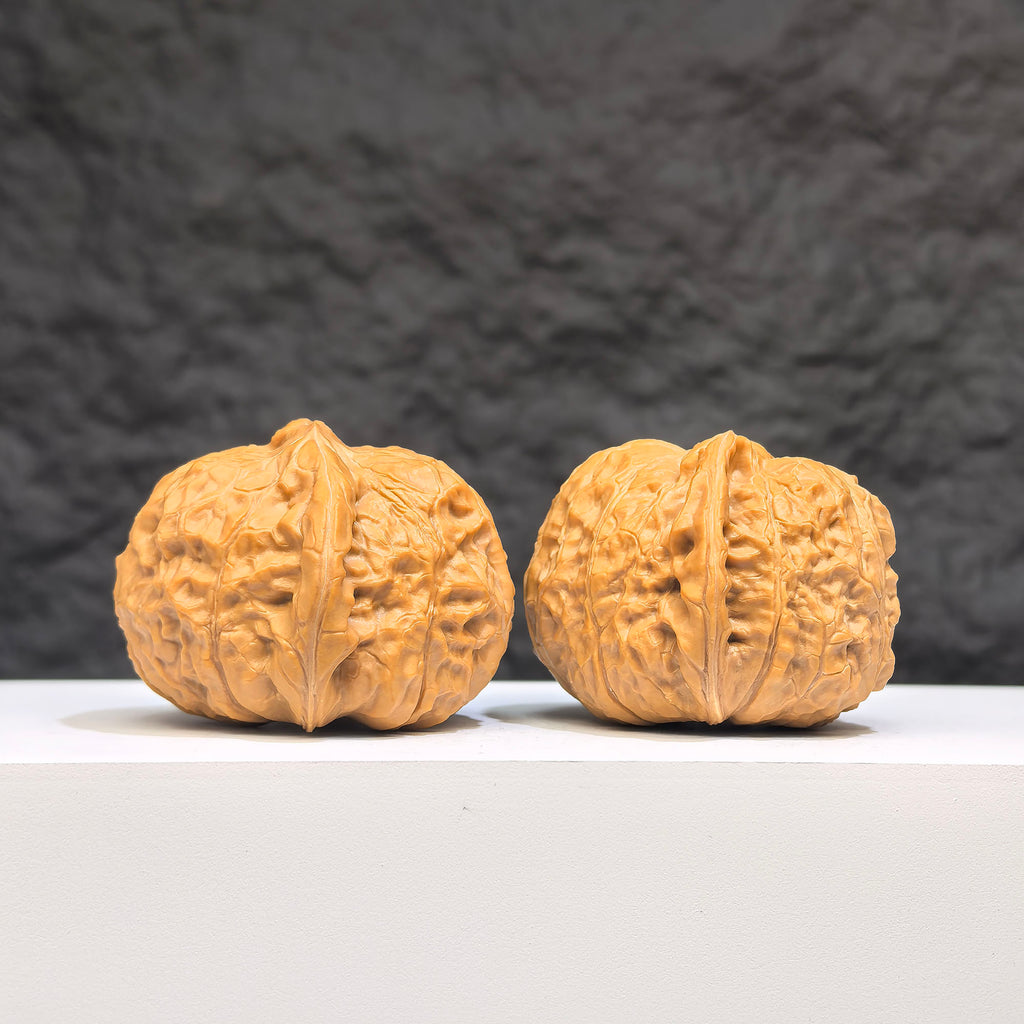 Pair of Wenwan Art Concave Base Pumpkin Pier Wenwan walnuts, deep-base with 40mm x 42mm size, showcasing detailed natural walnut features.