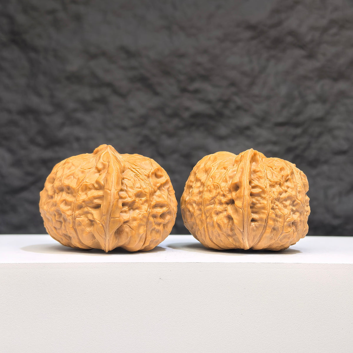 Pair of Wenwan Art Concave Base Pumpkin Pier Wenwan walnuts, deep-base with 40mm x 42mm size, showcasing detailed natural walnut features.
