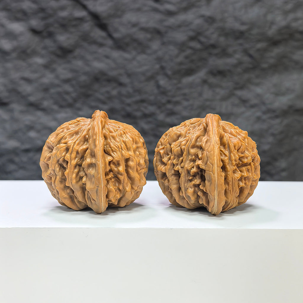 Pair of Sizuolou Wenwan walnuts by Wenwan Art, classic 41mm x 39mm size, showcasing natural wood grain and craftsmanship.