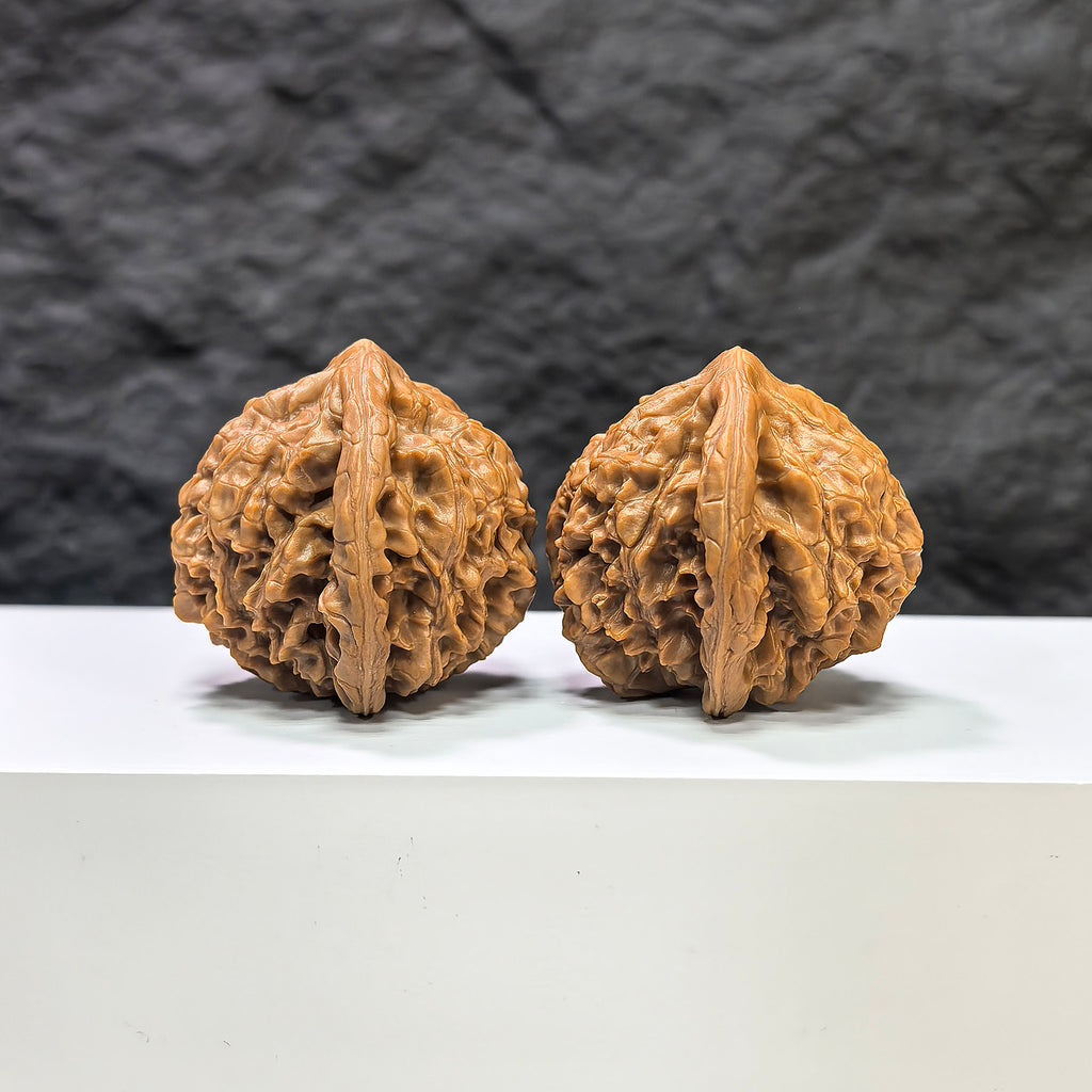 Golden Kylin Classic Wenwan Walnuts pair by Wenwan Art, featuring detailed carvings and natural walnut color, size 42mm x 40mm.