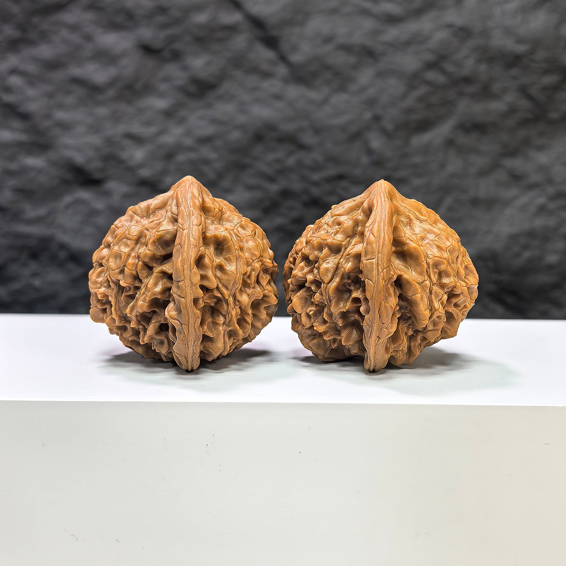 Golden Kylin Classic Wenwan Walnuts pair by Wenwan Art, featuring detailed carvings and natural walnut color, size 42mm x 40mm.