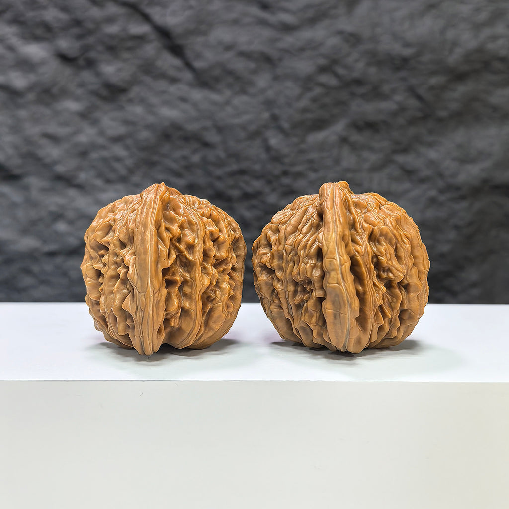Pair of Sizuolou Wenwan walnuts from Wenwan Art, 43mm x 39mm, featuring natural wood grain and traditional craftsmanship.